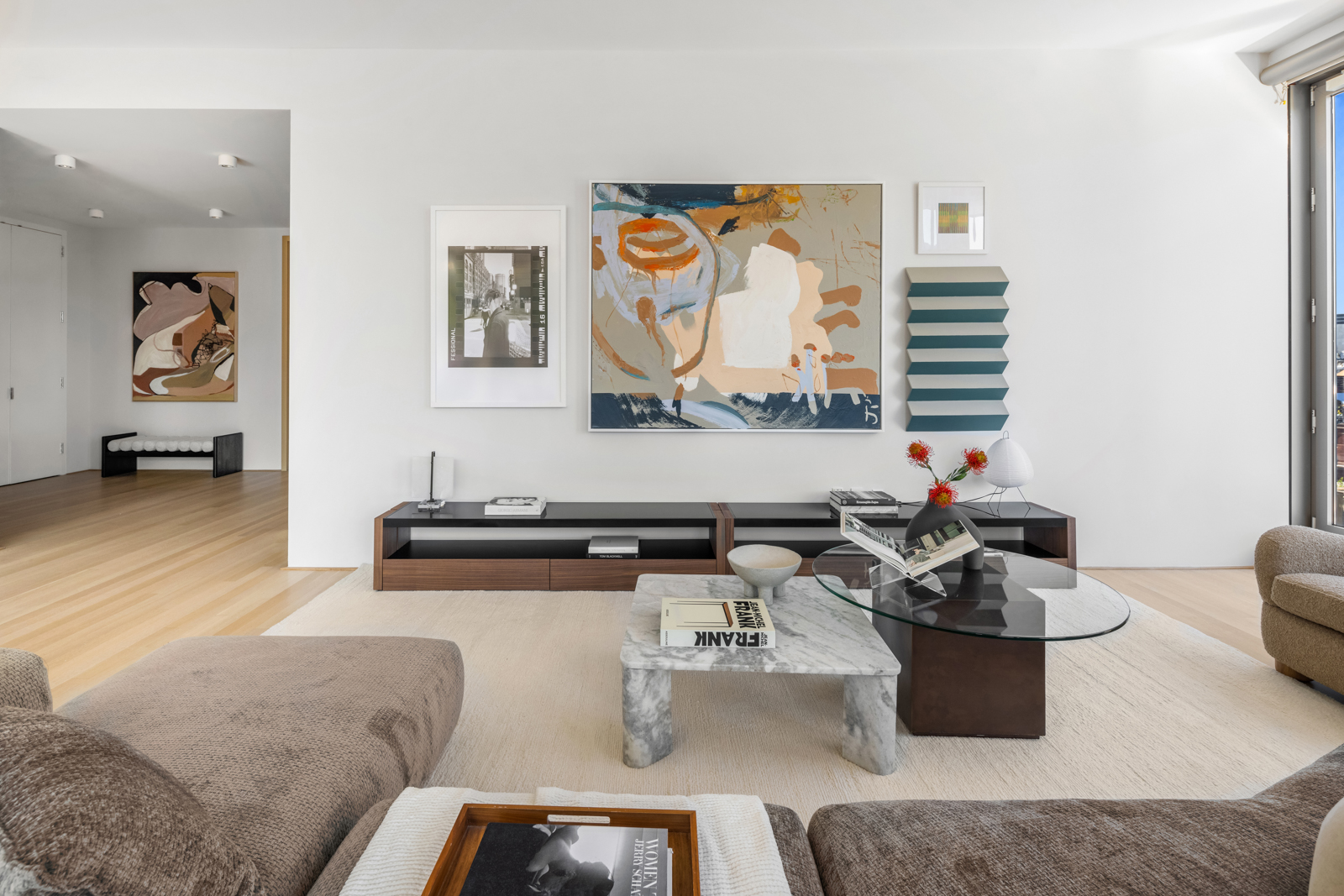 56 Leonard Street, Unit 14BEAST Manhattan, NY 10013 - Photo 19 of 35 a living room with furniture and a window