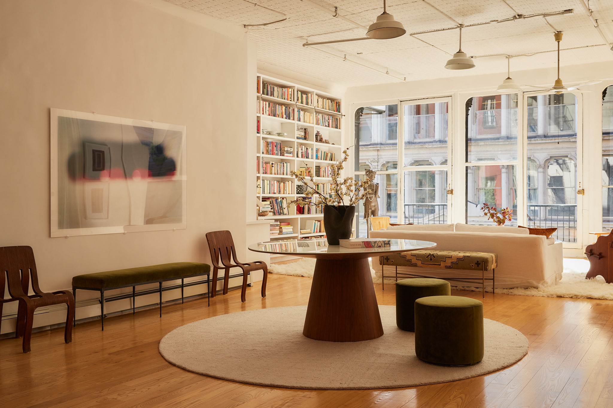2 Bond Street, Unit 2 Manhattan, NY 10012 - Photo 5 of 16 a living room with couches chairs and wooden floor