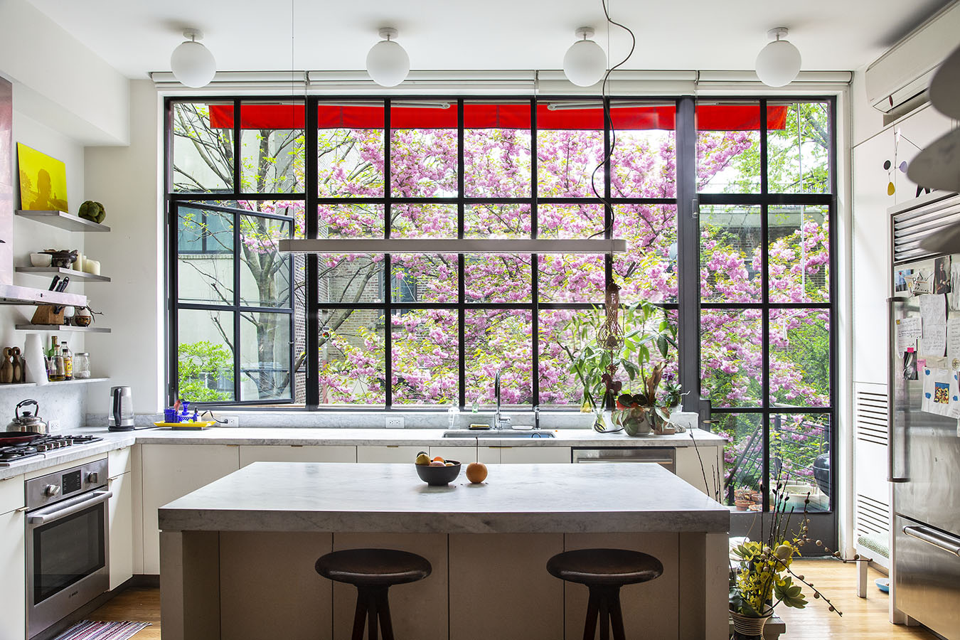 a kitchen with a sink and a window