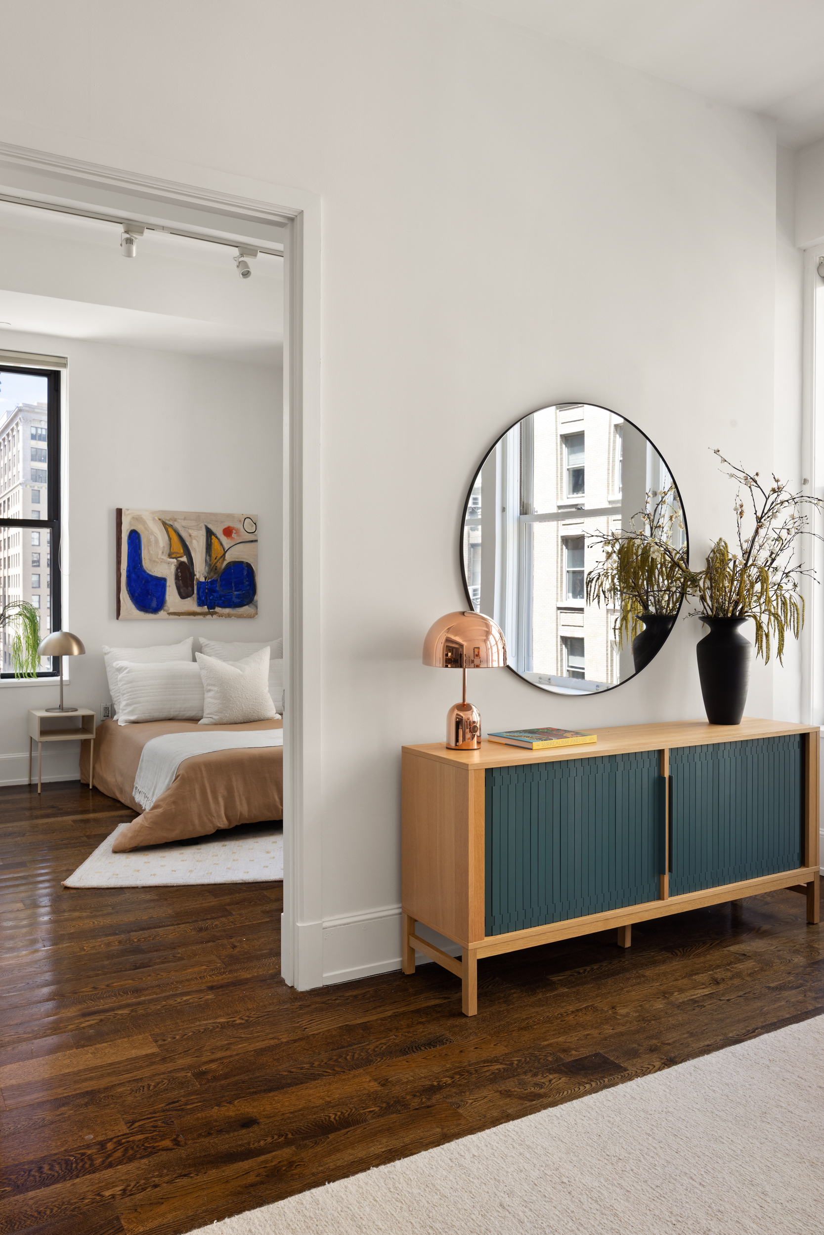 260 Park Avenue South, Unit 9G Manhattan, NY 10010 - Photo 10 of 17 a living room with furniture and a wooden floor