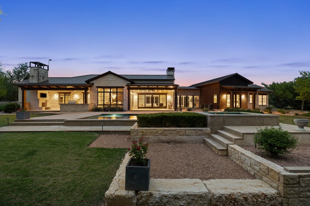 2560 Bell Springs Road Dripping Springs, TX 78620 - Photo 40 of 42 a front view of a house with a yard