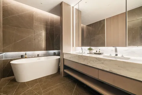 a bathroom with a bathtub and a sink