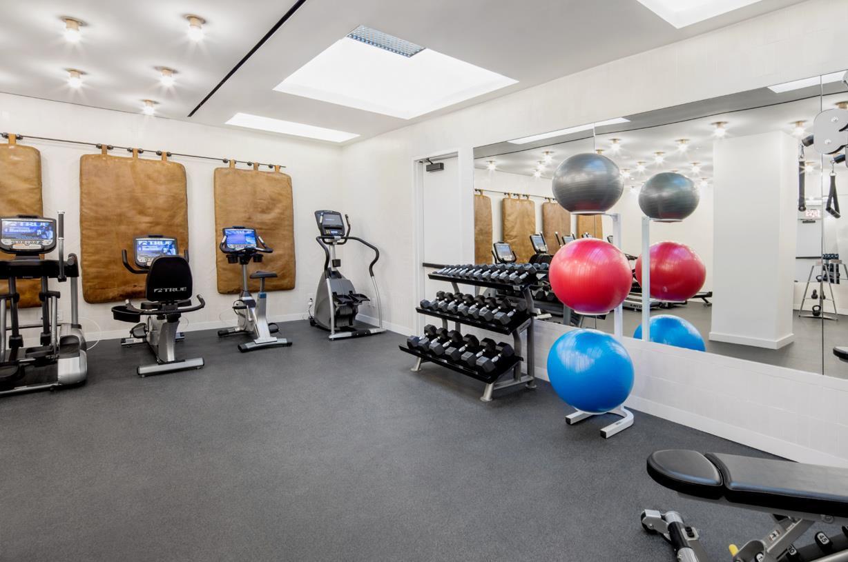 55 West 17th Street, Unit 701 Manhattan, NY 10011 - Photo 15 of 20 a view of a room with gym equipment