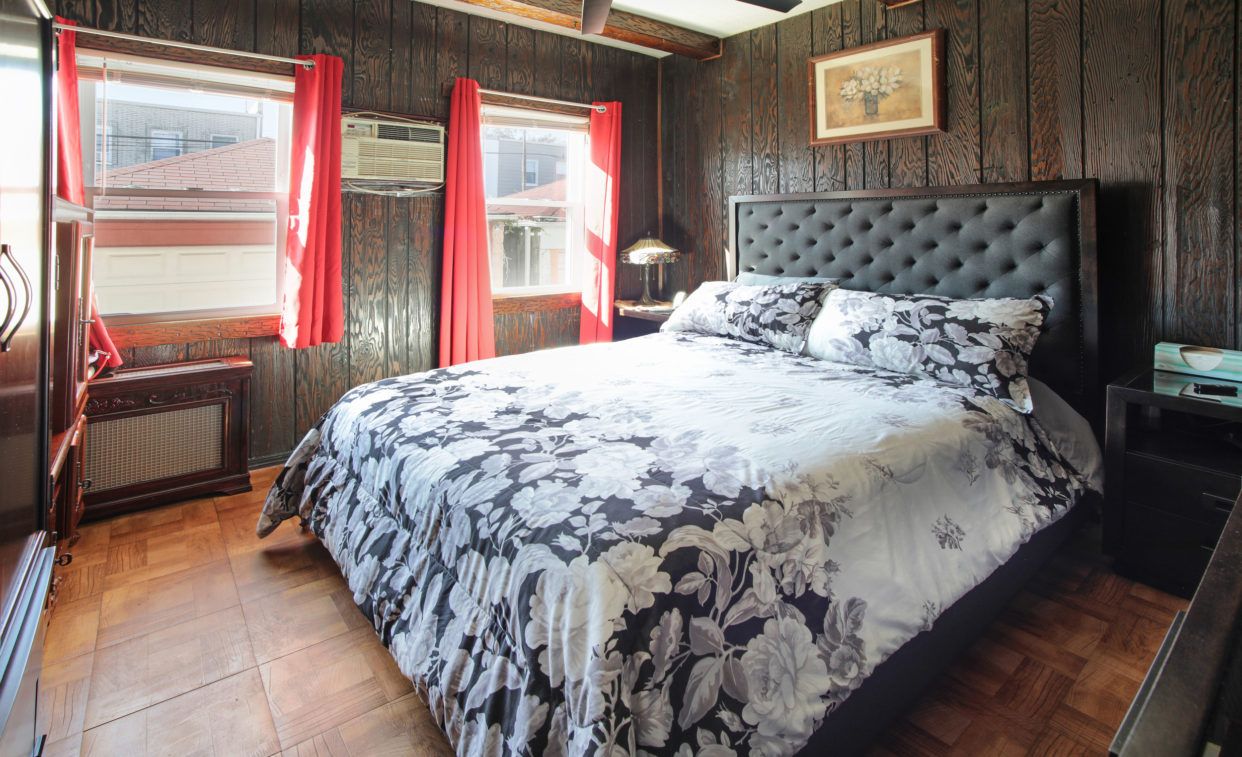 1532 Kimball Street Brooklyn, NY 11234 - Photo 8 of 13 a bed sitting in a bedroom next to a window