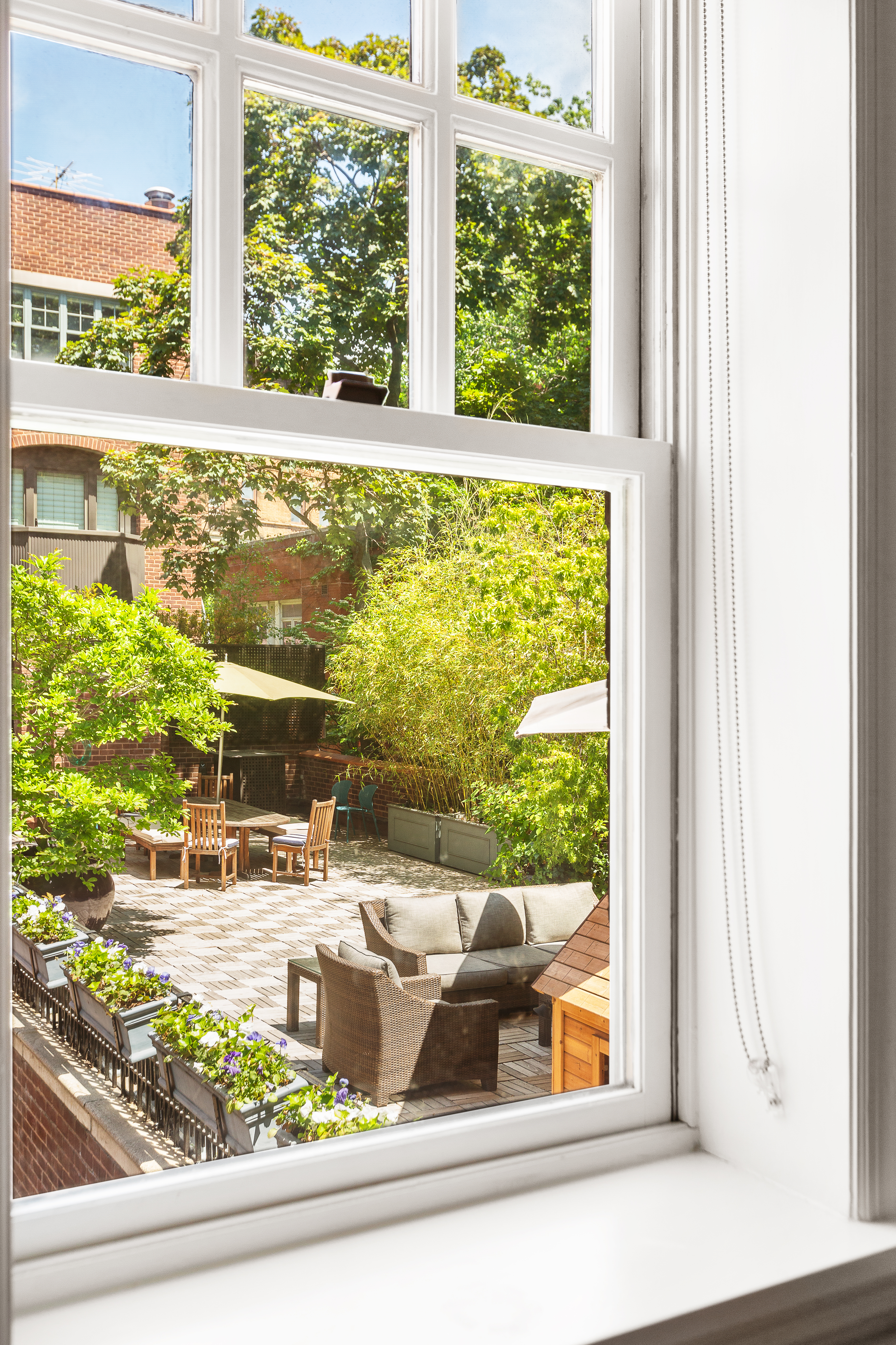 687 Greenwich Street, Unit TH7 Manhattan, NY 10014 - Photo 12 of 23 a view of a lake from a window