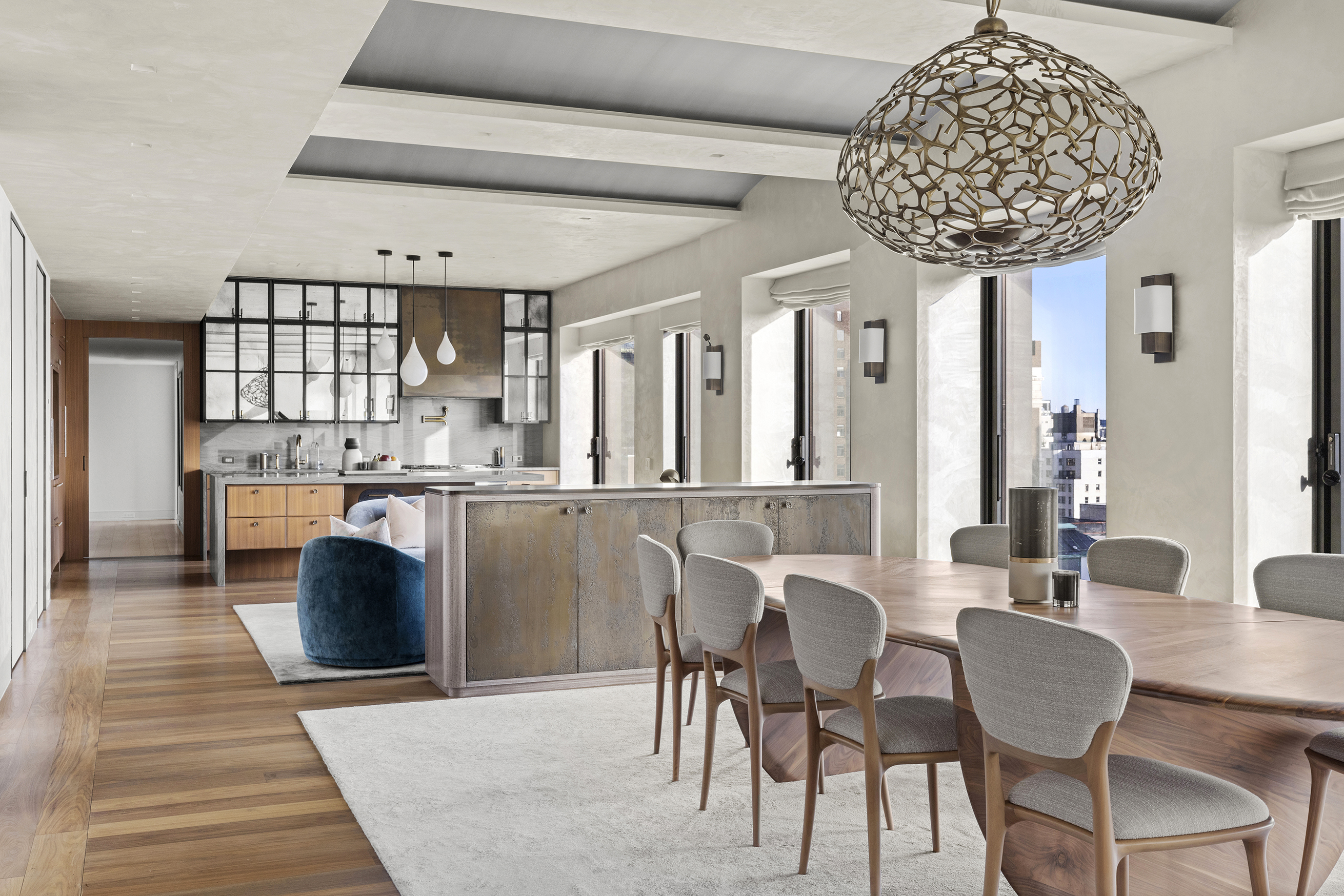 55 West 17th Street, Unit PH Manhattan, NY 10011 - Photo 7 of 36 a dining room with furniture and a kitchen view