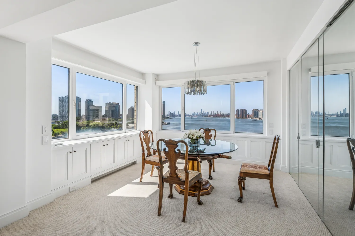 a view of a dining room with furniture window and outside view