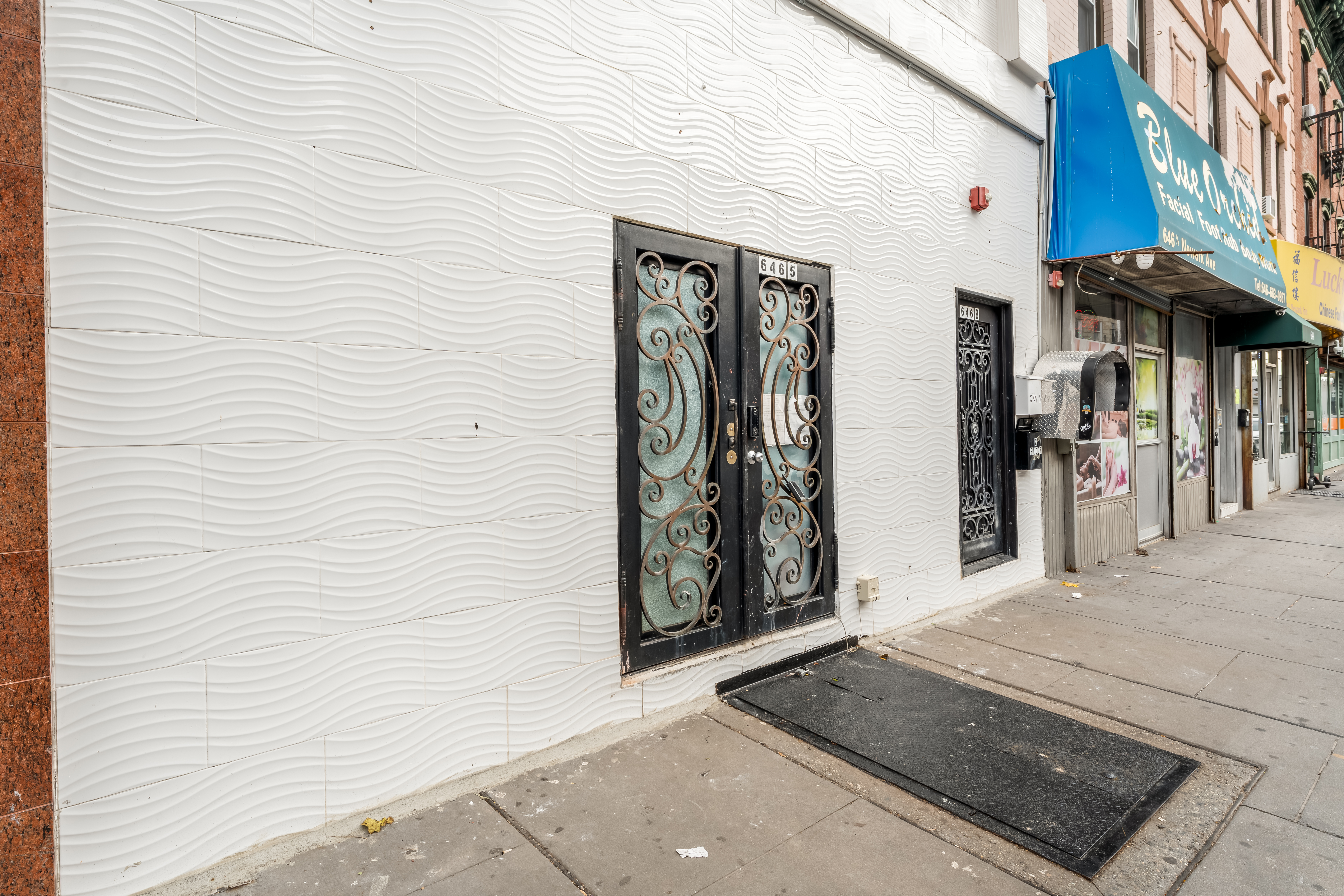 646 Newark Avenue, Unit COMMERCIAL Jersey City, NJ 07306 - Photo 33 of 35 a view of a entryway door front of house