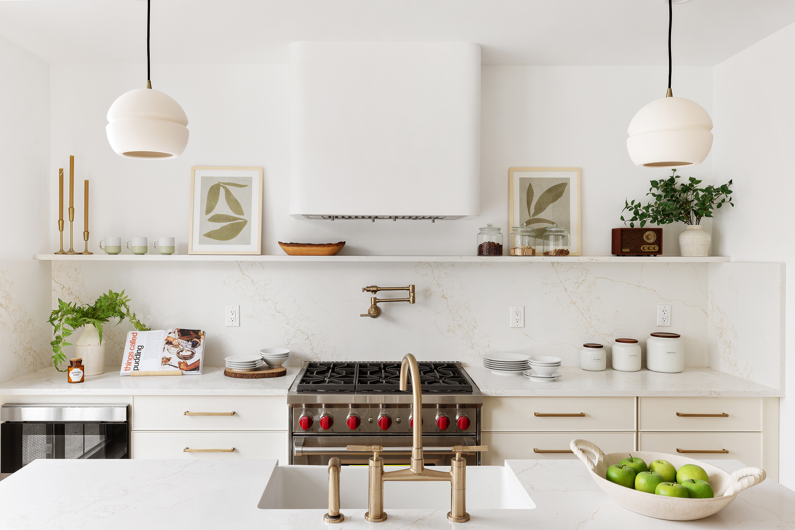 557 Saint Marks Avenue Brooklyn, NY 11216 - Photo 6 of 13 a kitchen with stainless steel appliances a white table chairs and a wooden floor