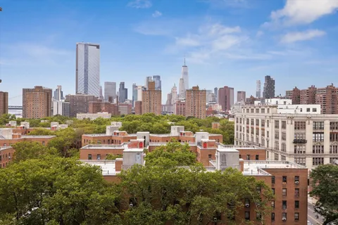 a view of a city with tall buildings