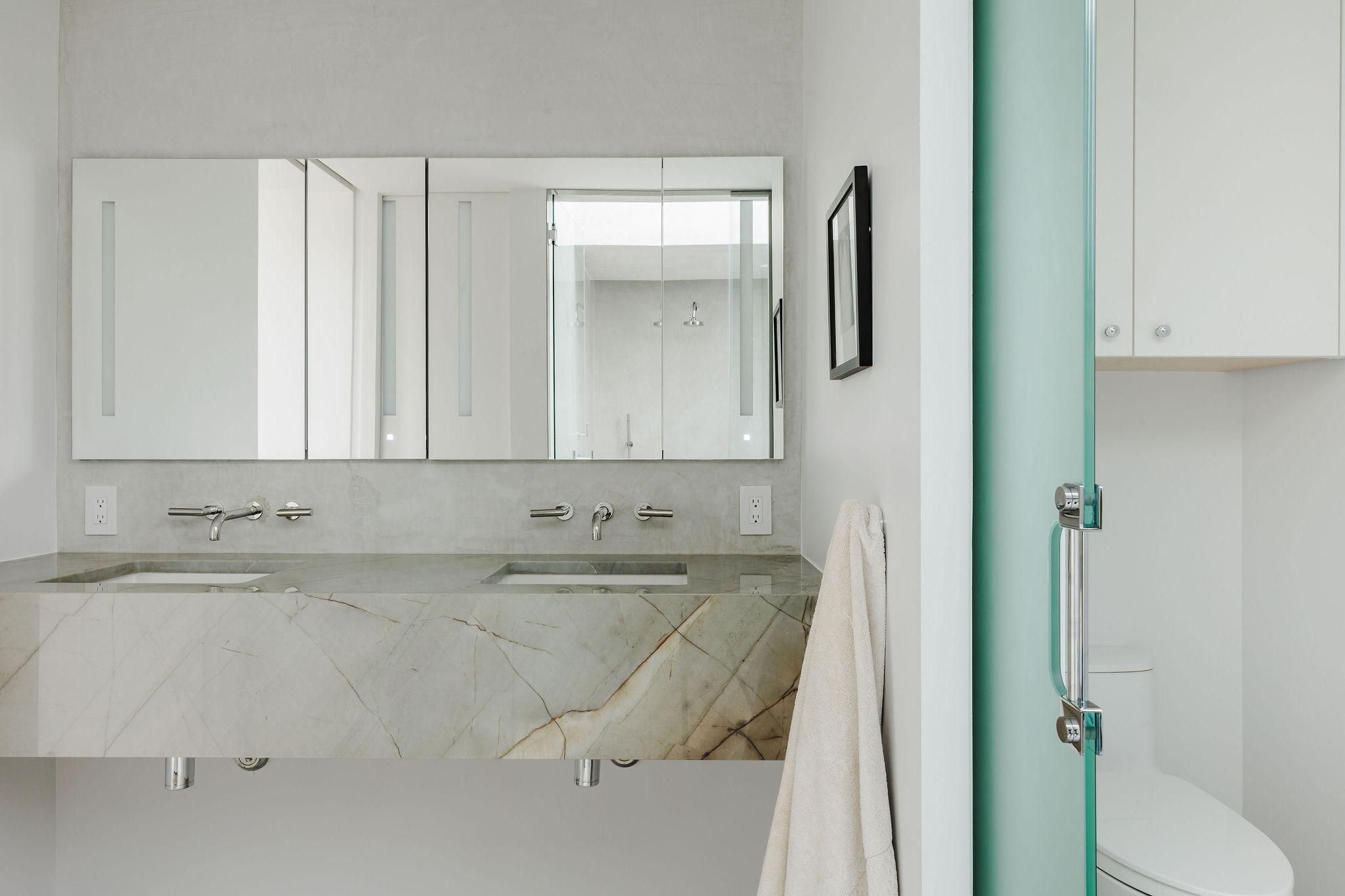 606 West 35th Street Austin, TX 78705 - Photo 27 of 37 a bathroom with a sink and mirror with toilet