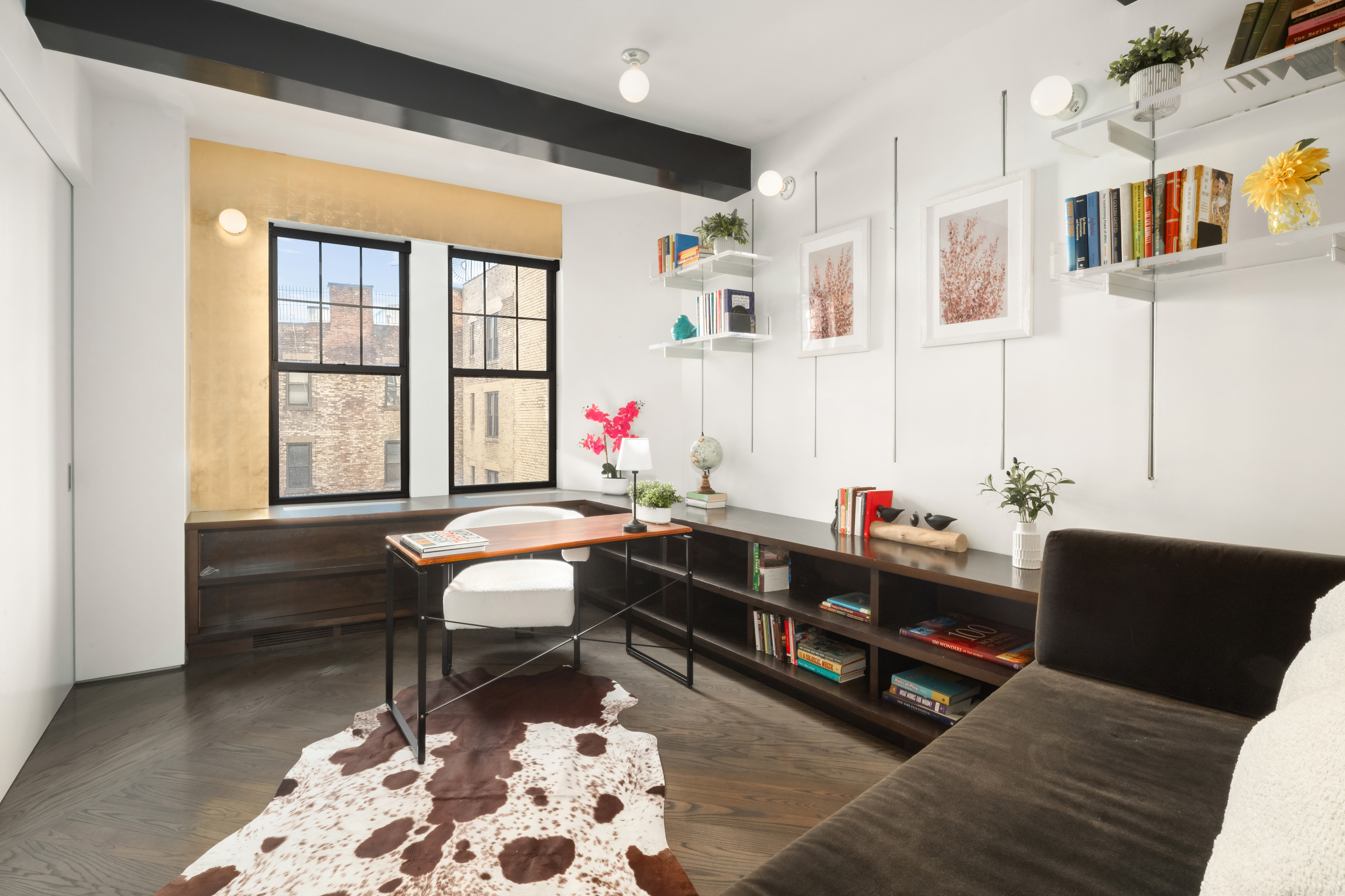 170 2nd Avenue, Unit 5A Manhattan, NY 10003 - Photo 8 of 15 a living room with furniture and a table