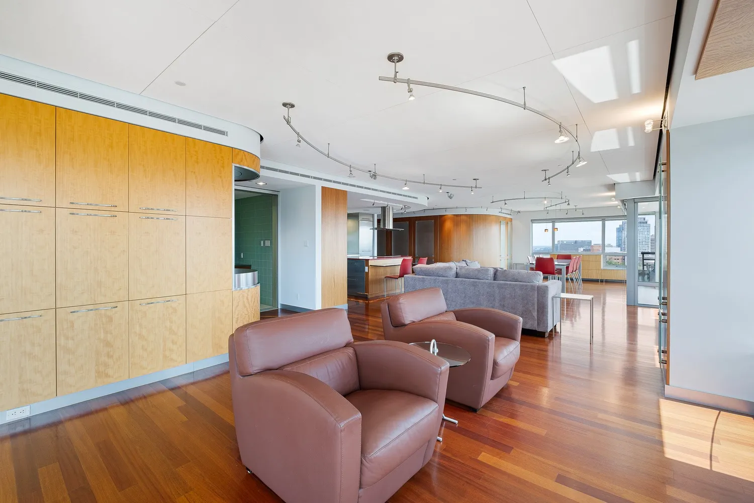 a view of a city with tall buildings in the background