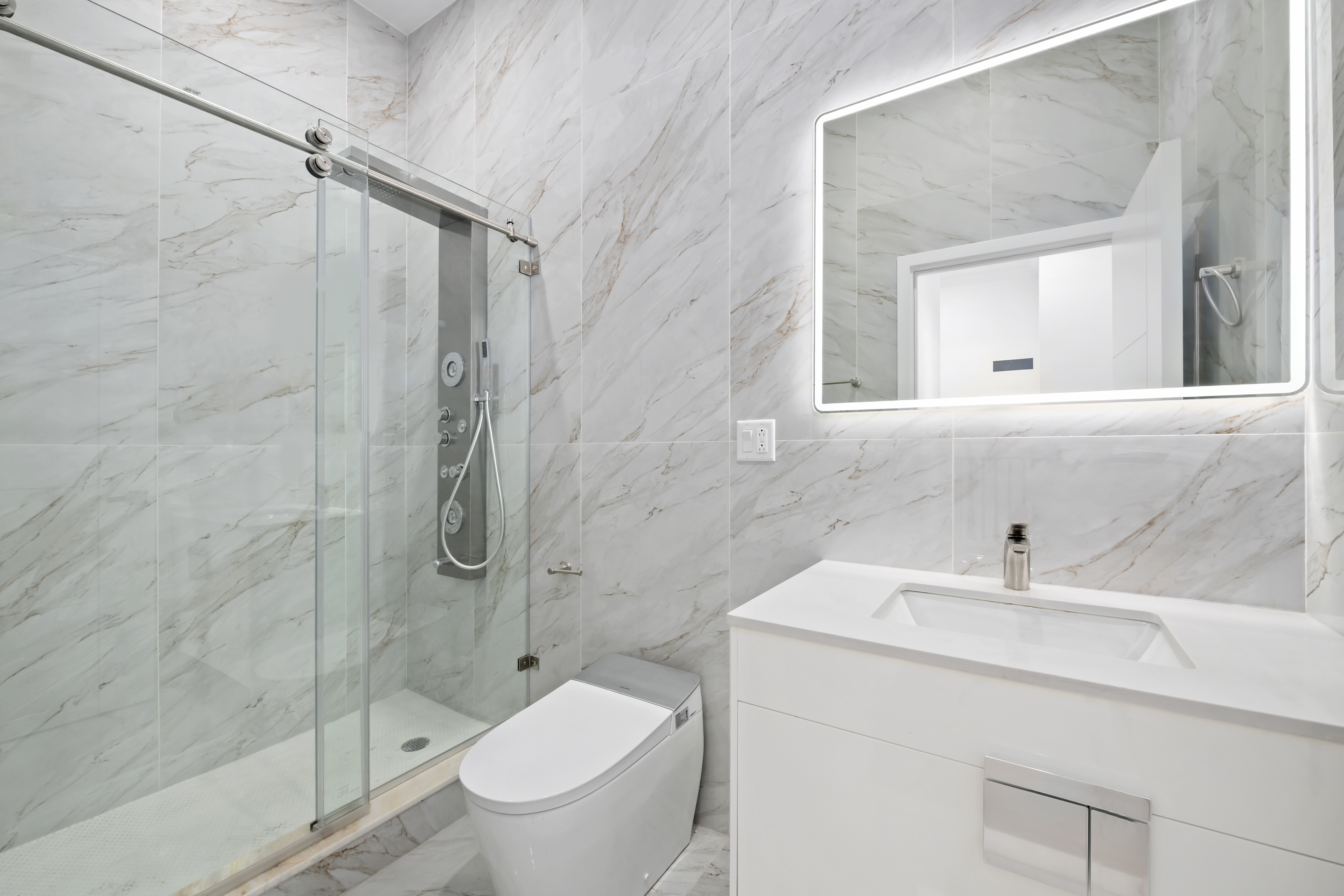 84 Himrod Street Brooklyn, NY 11221 - Photo 20 of 35 a bathroom with a sink toilet and shower