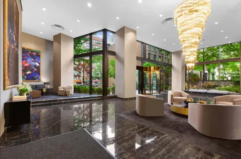 a large living room with large windows