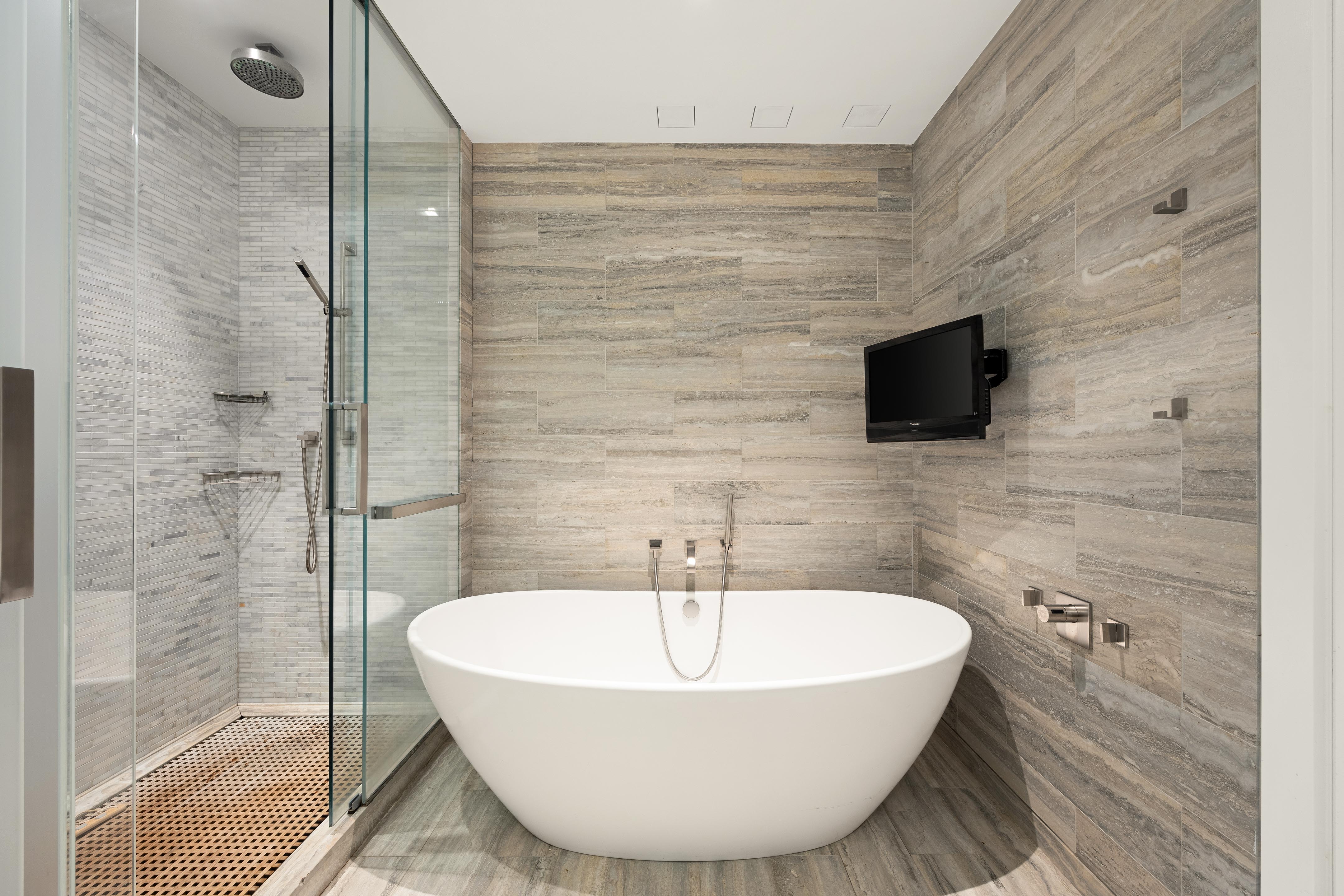 400 West 12th Street, Unit 4J Manhattan, NY 10014 - Photo 8 of 21 a bathroom with a sink and a mirror