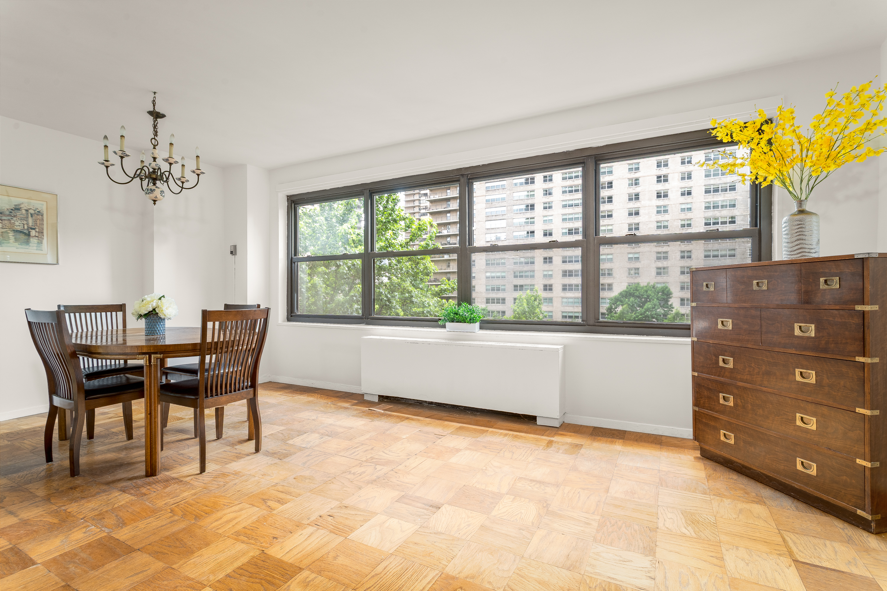 180 West End Avenue, Unit 5H Manhattan, NY 10023 - Photo 5 of 18 a dining room with furniture and window