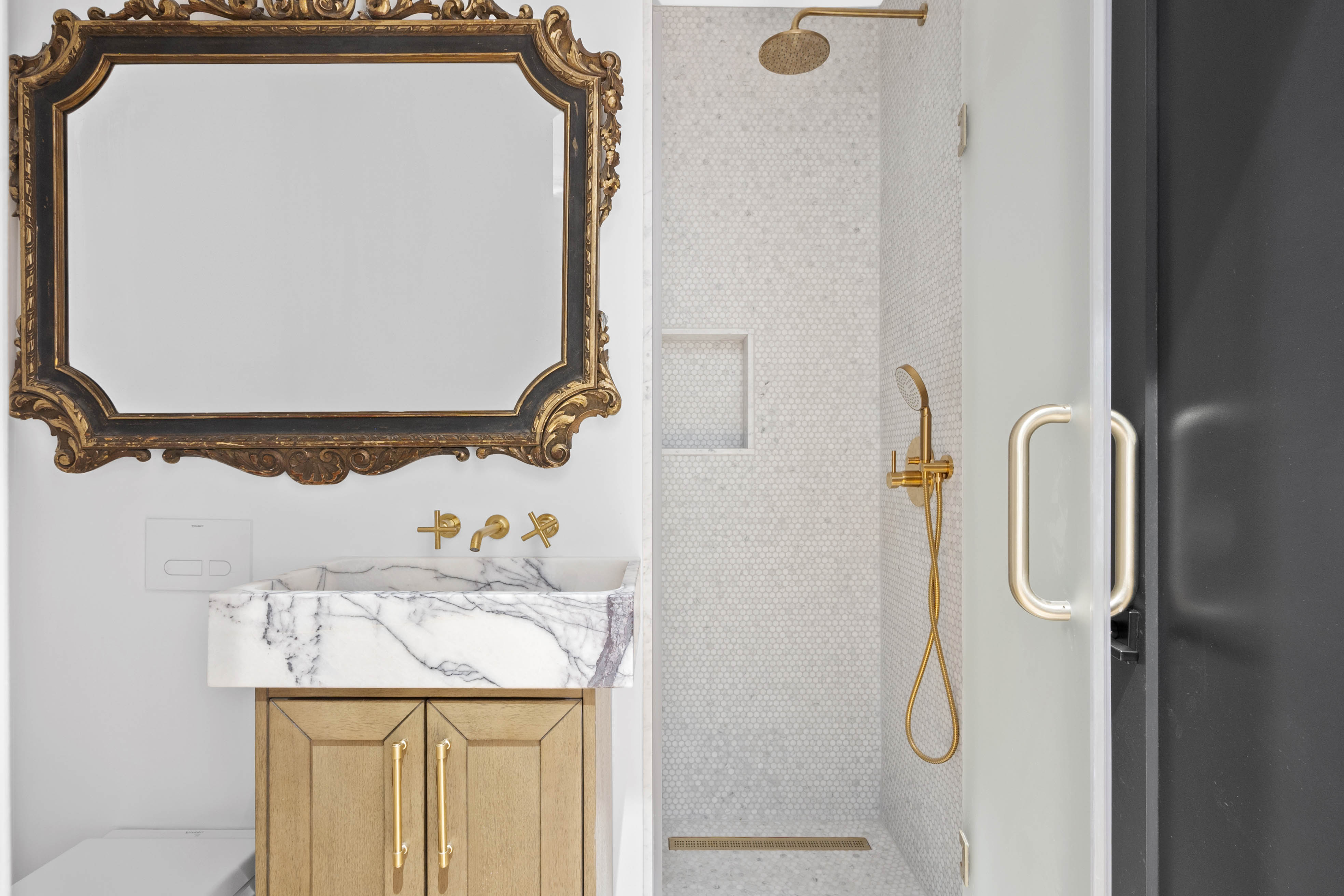 33 West 67th Street, Unit 4M Manhattan, NY 10023 - Photo 14 of 16 a bathroom with a sink and mirror