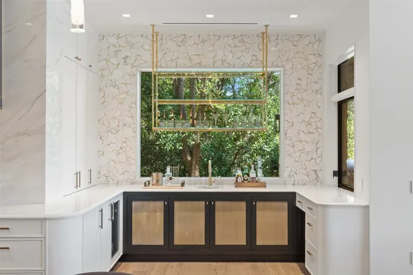 a bathroom with a bathtub and a sink