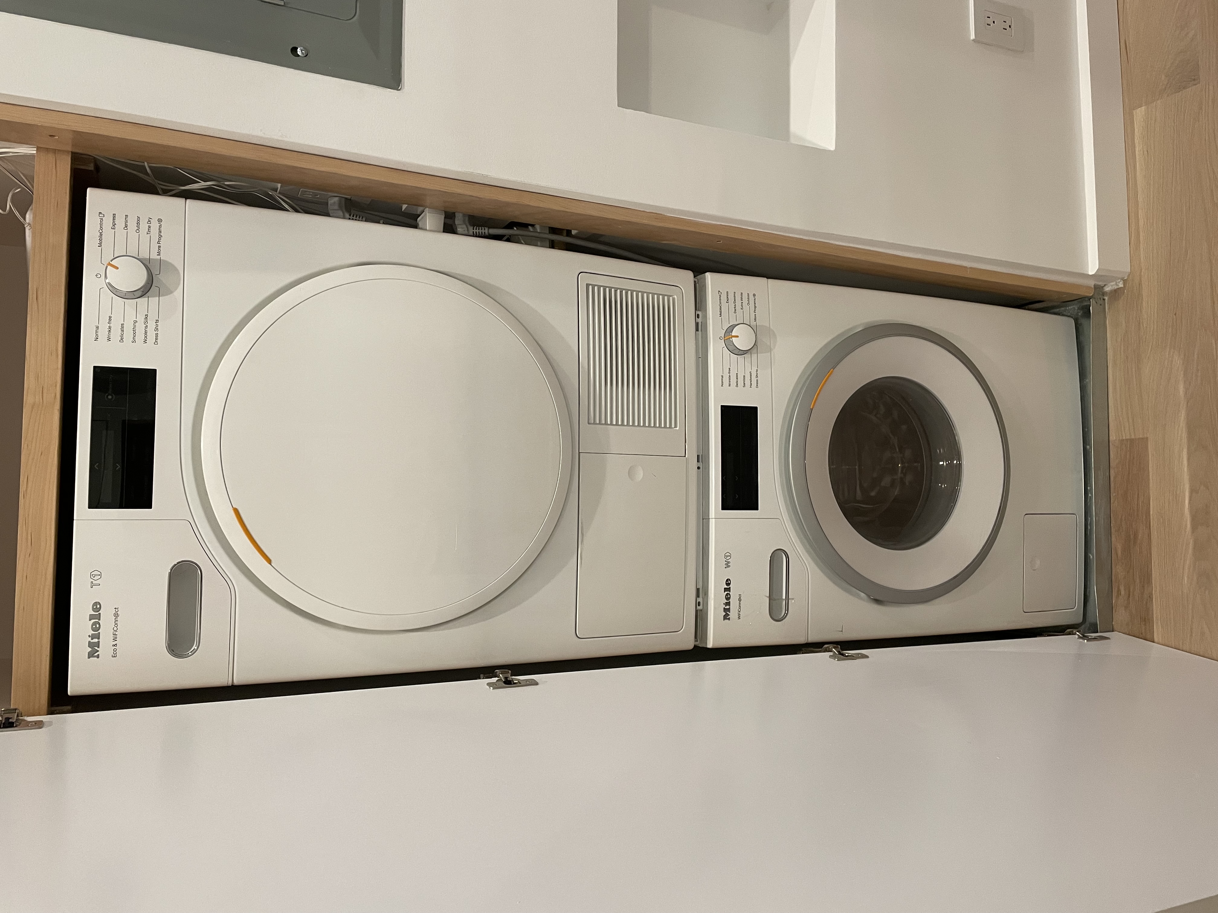 23 East 10th Street, Unit 508 Manhattan, NY 10003 - Photo 9 of 21 a utility room with dryer and washer