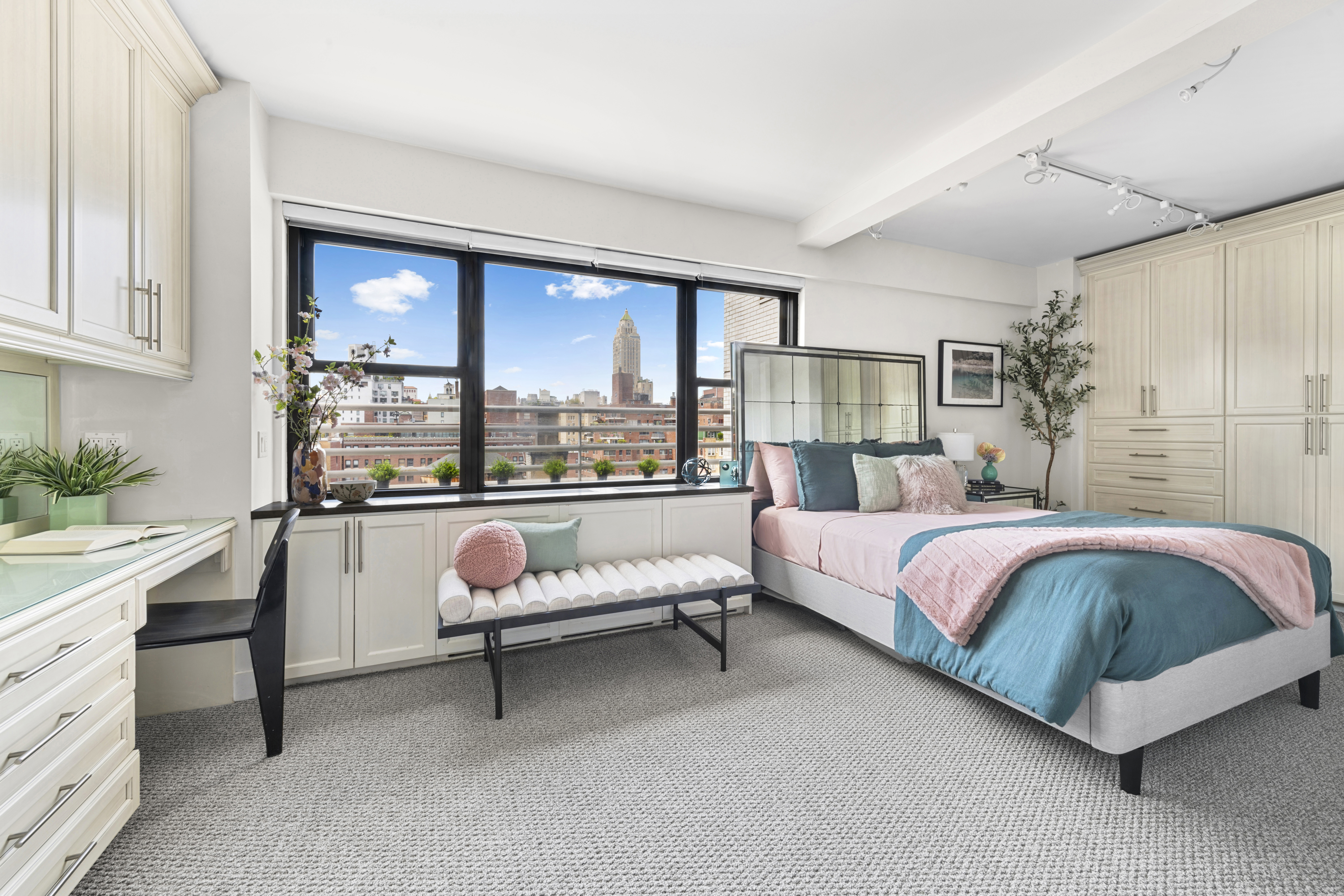 196 East 75th Street, Unit 16G Manhattan, NY 10021 - Photo 5 of 10 a bedroom with a bed chair and window