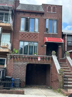 a front view of a house with balcony