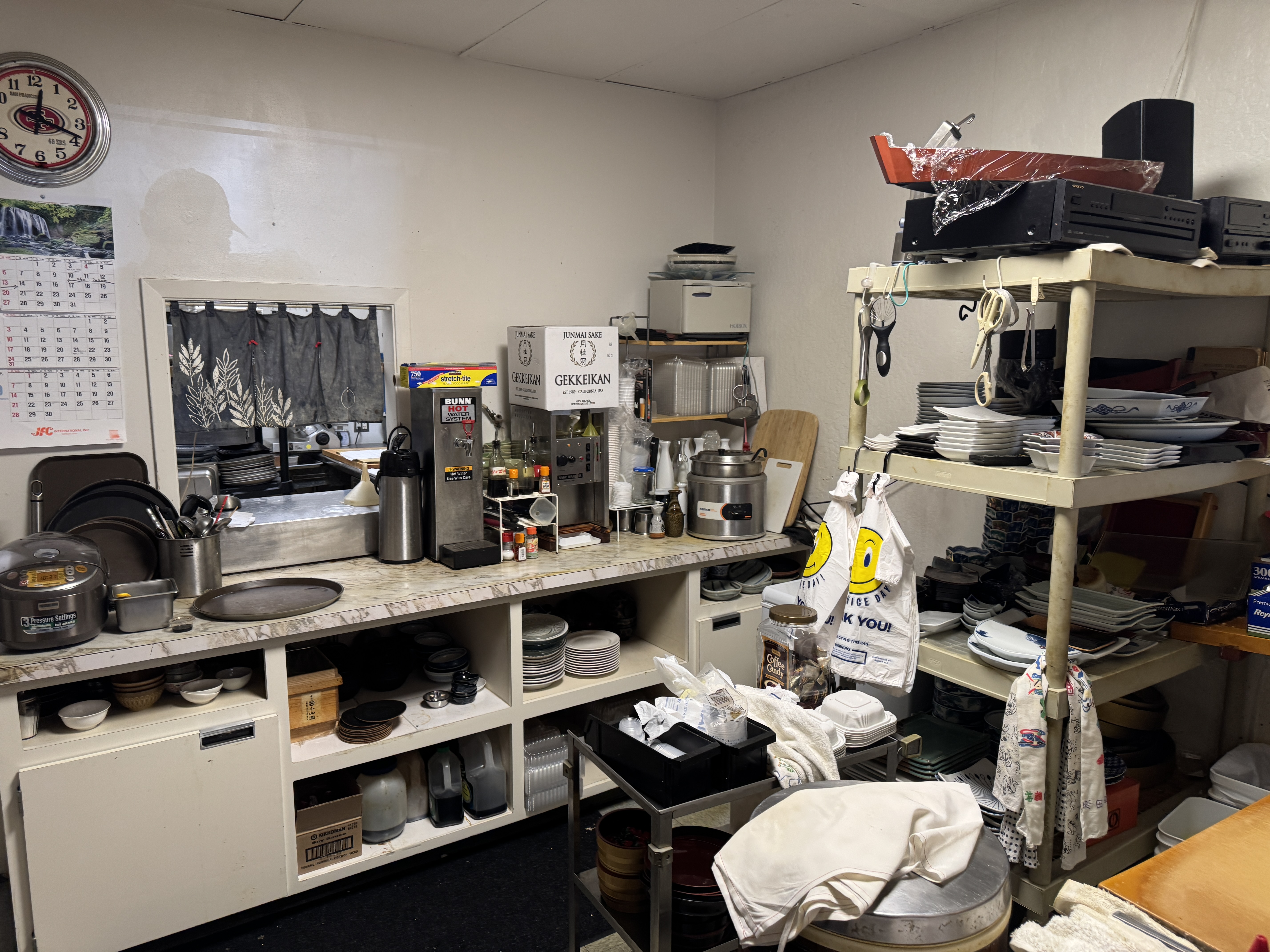 580 Crespi Drive, Unit A Pacifica, CA 94044 - Photo 6 of 25 a room with furniture a flat screen tv and clock on the wall