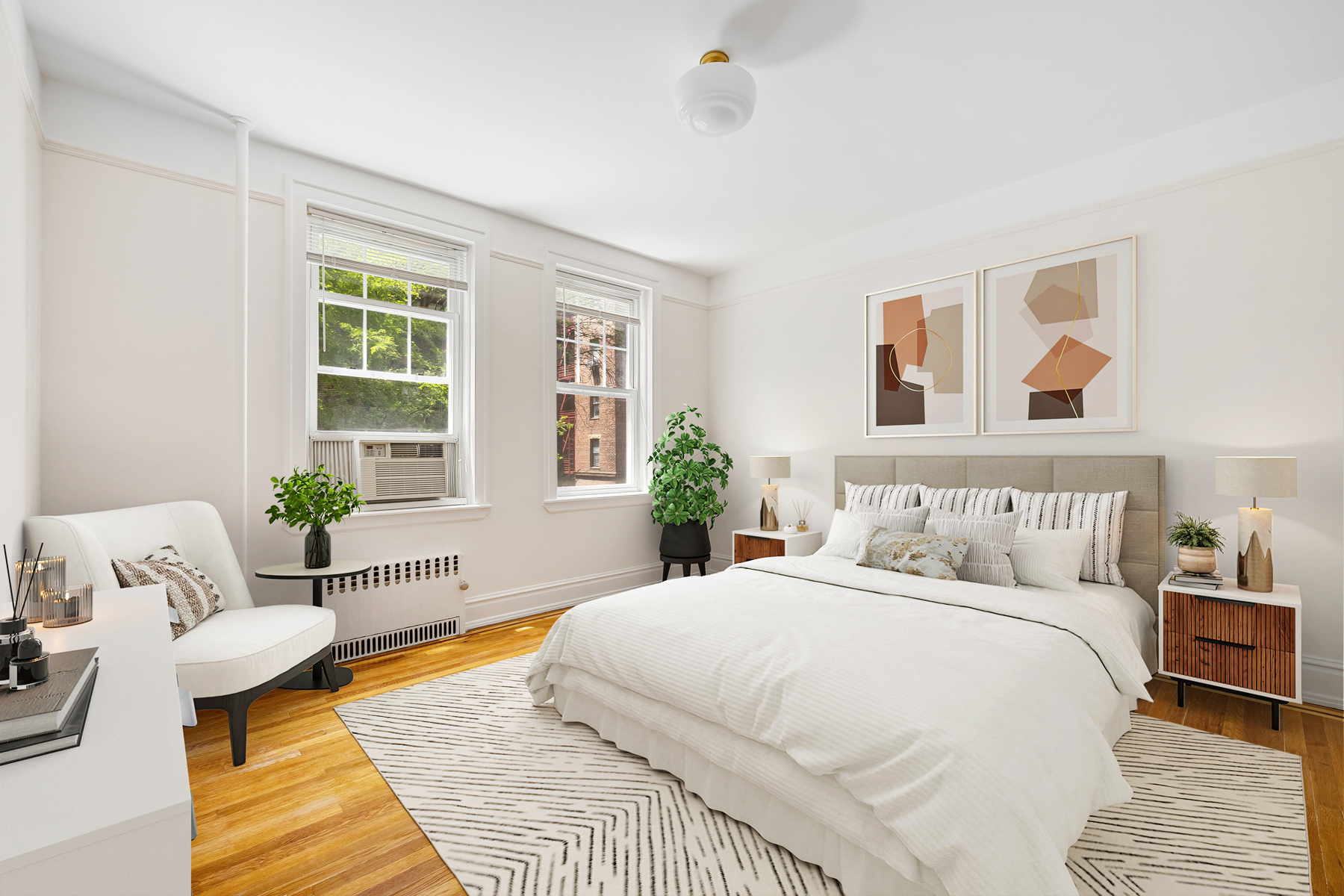 35-27 76th Street, Unit 21 Queens, NY 11372 - Photo 13 of 24 a spacious bedroom with a bed a couch and a window