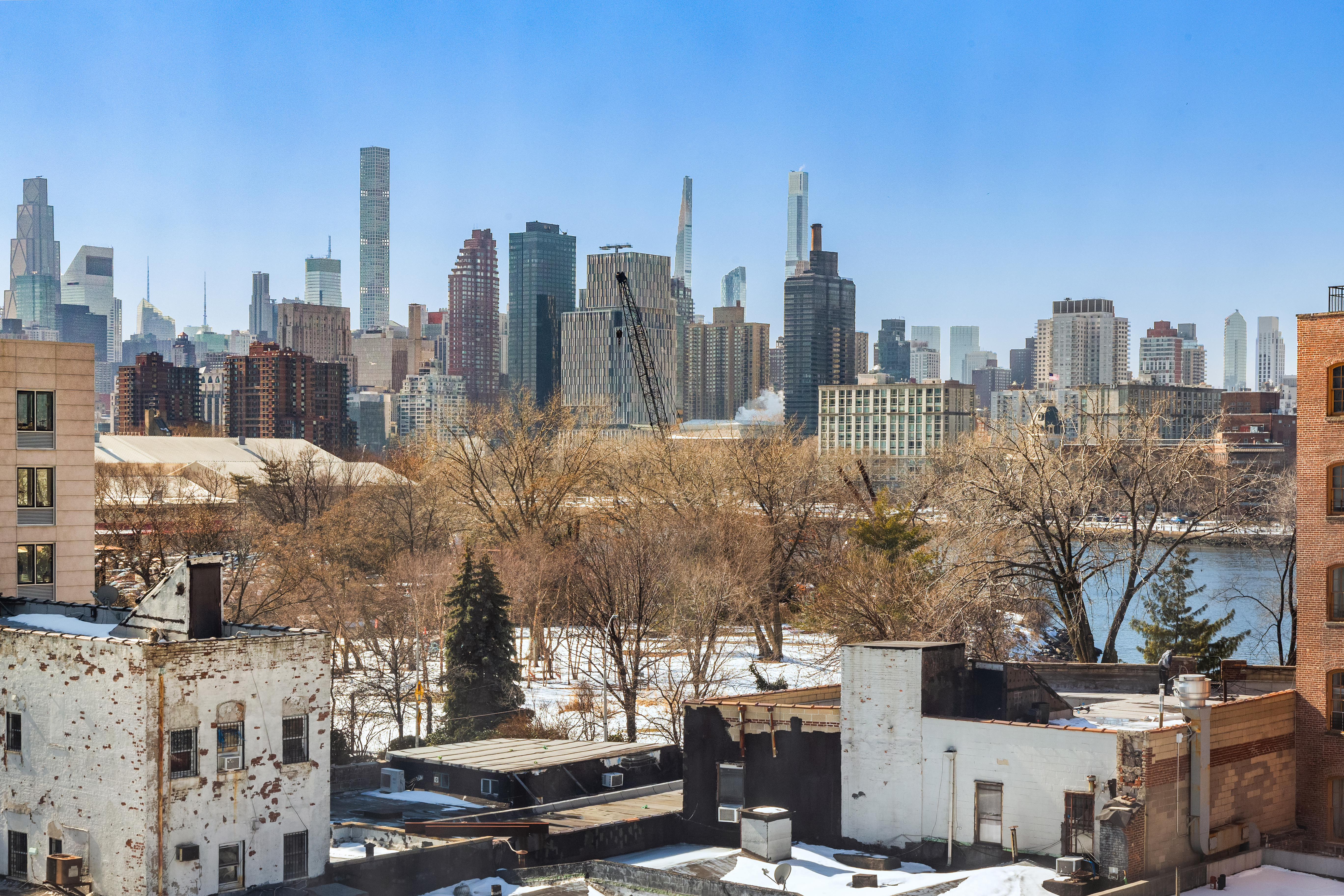 11-24 31st Avenue, Unit 5A Queens, NY 11106 - Photo 4 of 11 a view of a city with tall buildings