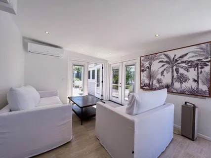 a living room with furniture and a couch