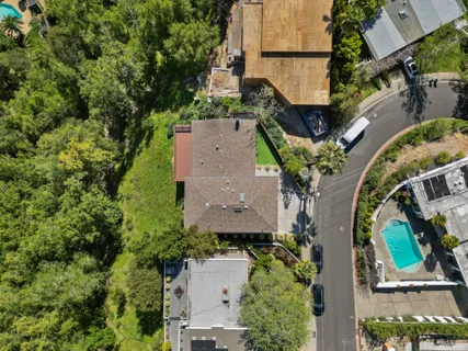 a house view with a backyard space