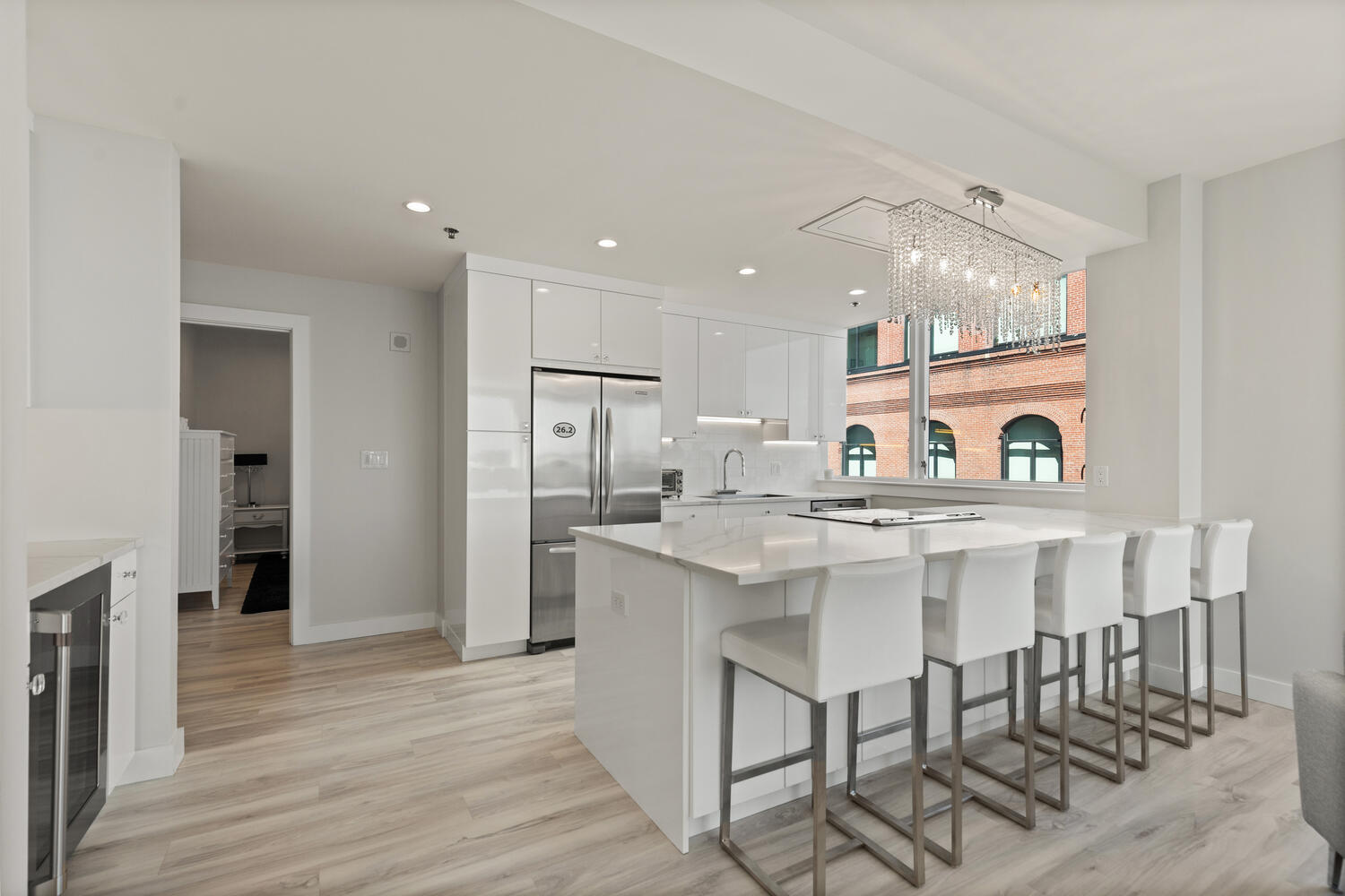 234 Causeway Street, Unit 709 Boston, MA 02114 - Photo 5 of 28 a kitchen with stainless steel appliances a sink and a refrigerator