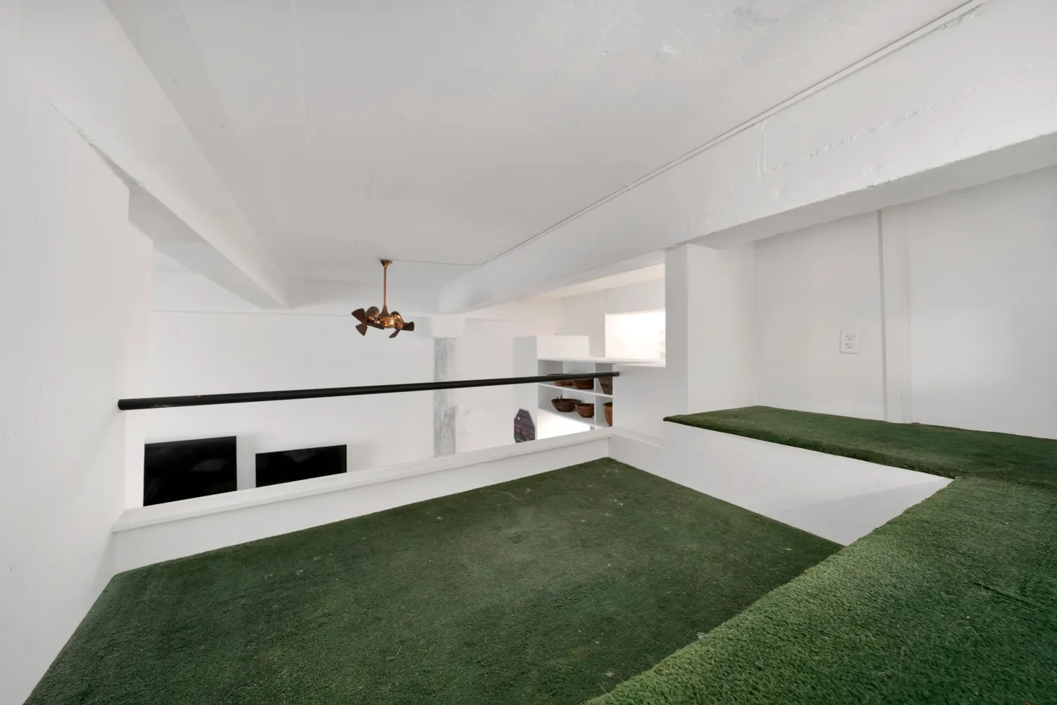 a view of a living room hardwood floor