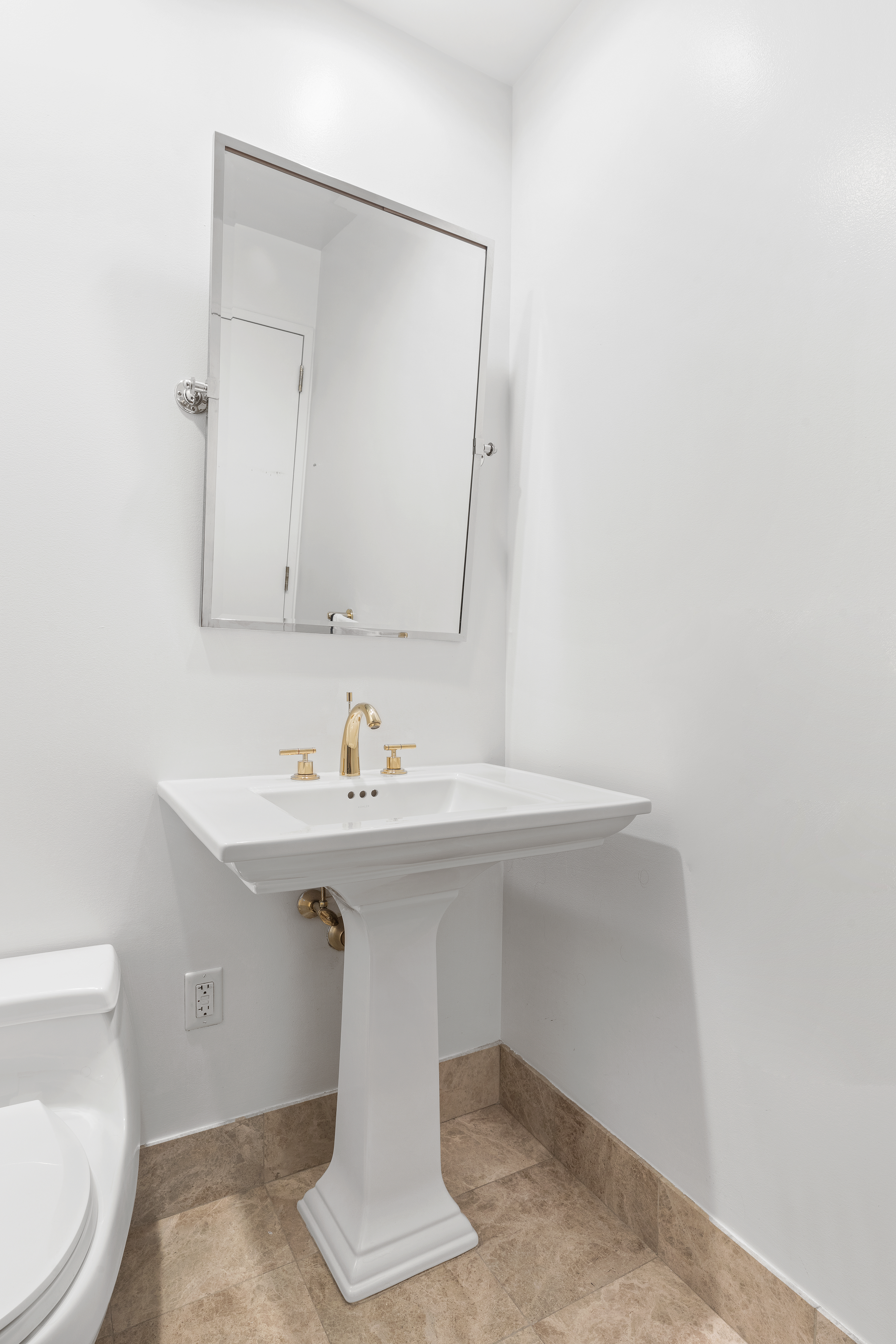 220 Riverside Boulevard, Unit 7G Manhattan, NY 10069 - Photo 6 of 11 a bathroom with a sink and a toilet