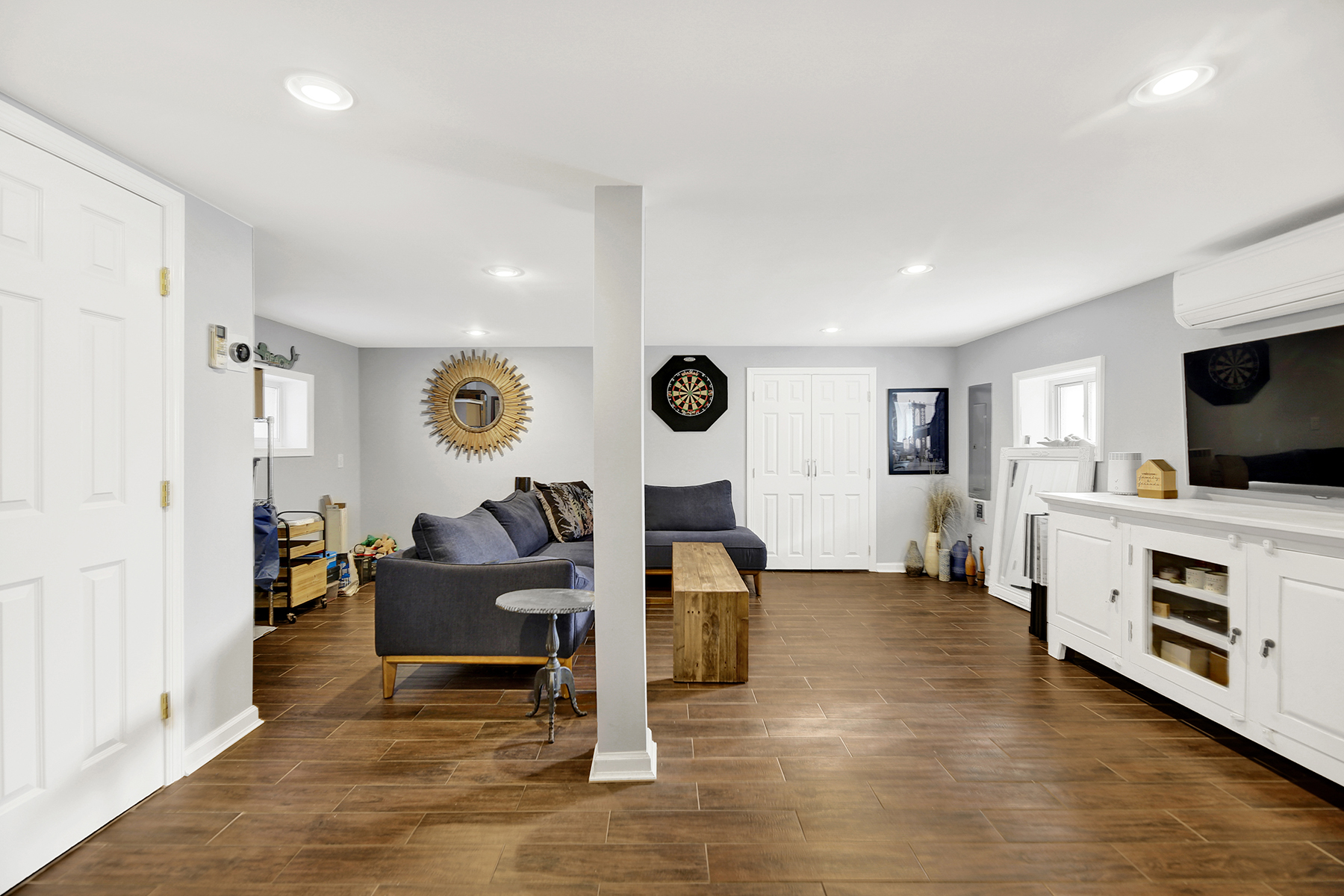 4-53 Beach 142nd Street Queens, NY 11694 - Photo 27 of 39 a living room with furniture and a flat screen tv
