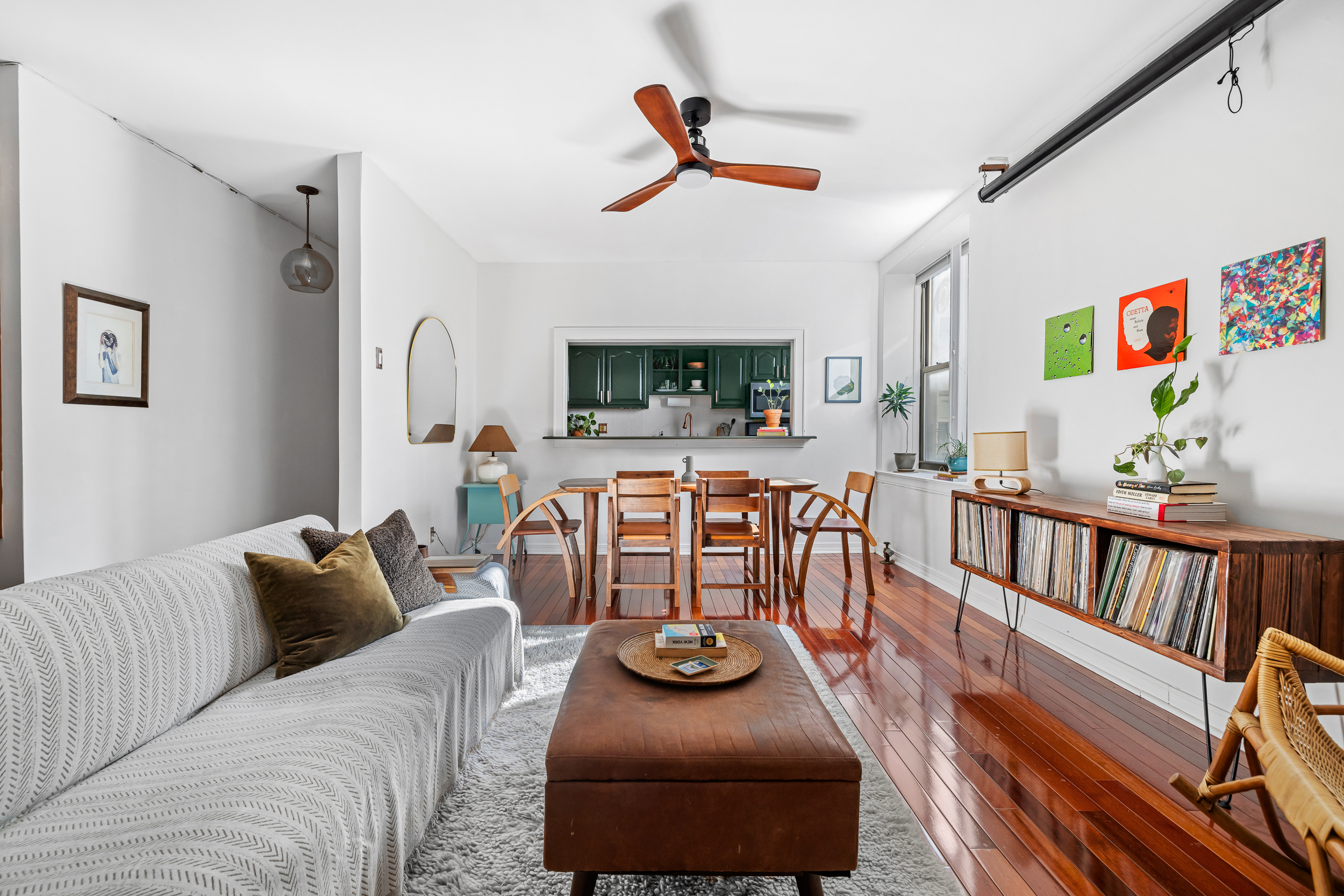 7901 4th Avenue Brooklyn, NY 11209 - Photo 1 of 10 a living room with furniture and a flat screen tv