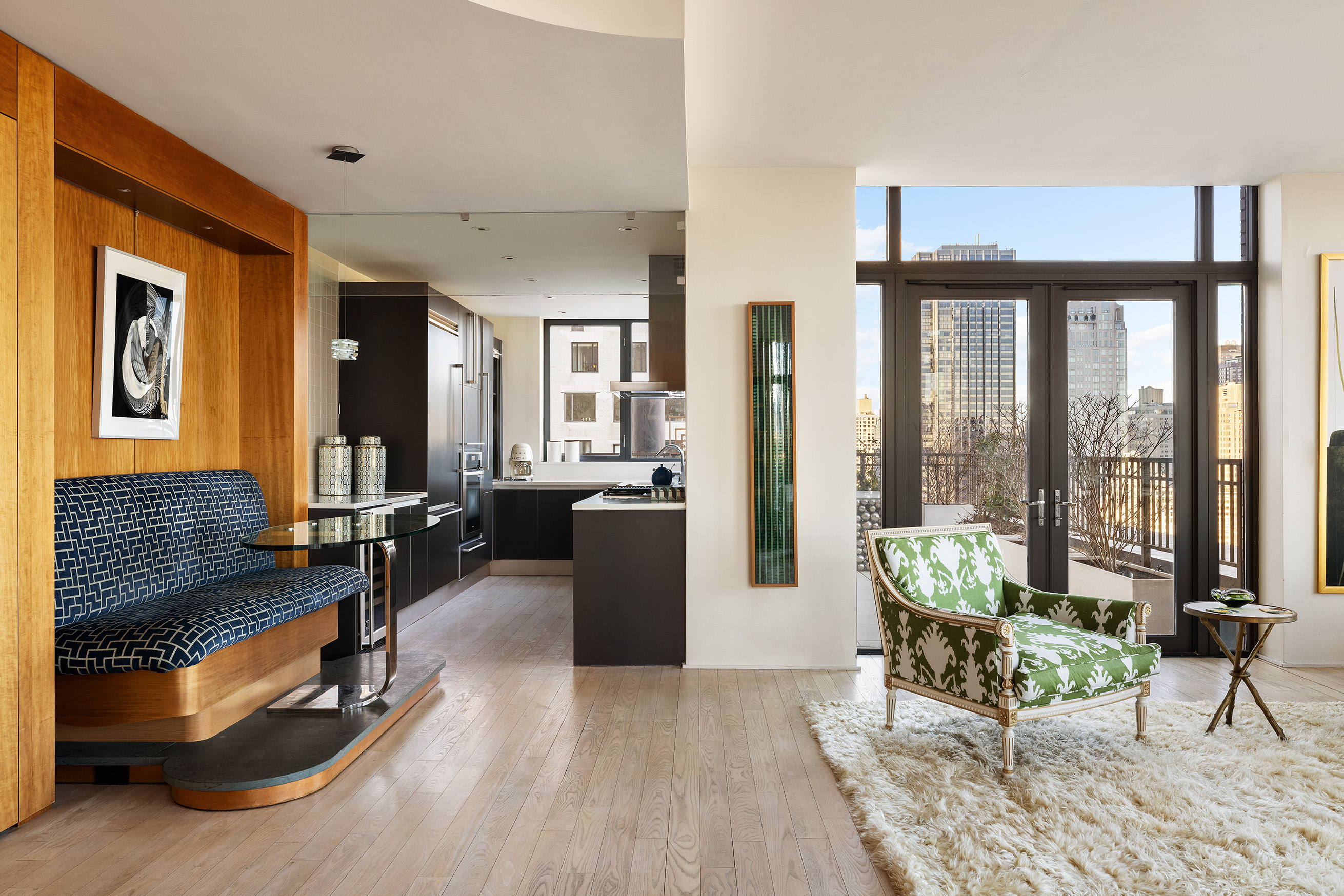 110 Central Park South, Unit PH1 Manhattan, NY 10019 - Photo 9 of 26 a living room with furniture windows and wooden floor
