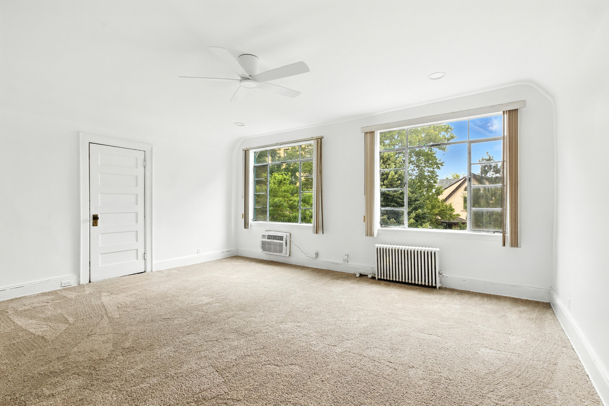 1070 East 13th Street Brooklyn, NY 11230 - Photo 9 of 18 an empty room with windows