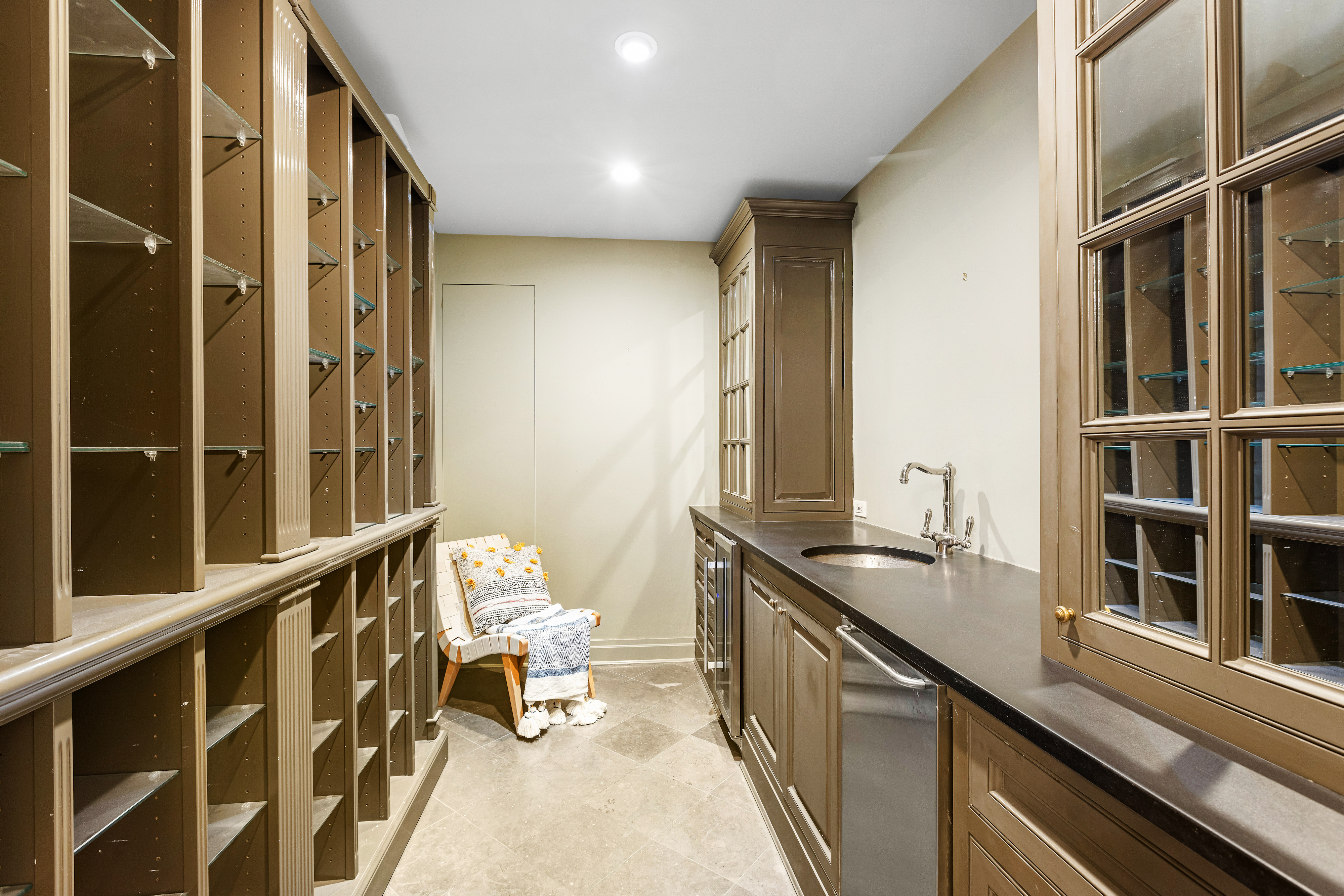25 East 86th Street, Unit 1C Manhattan, NY 10028 - Photo 14 of 18 a bathroom with a sink and a mirror
