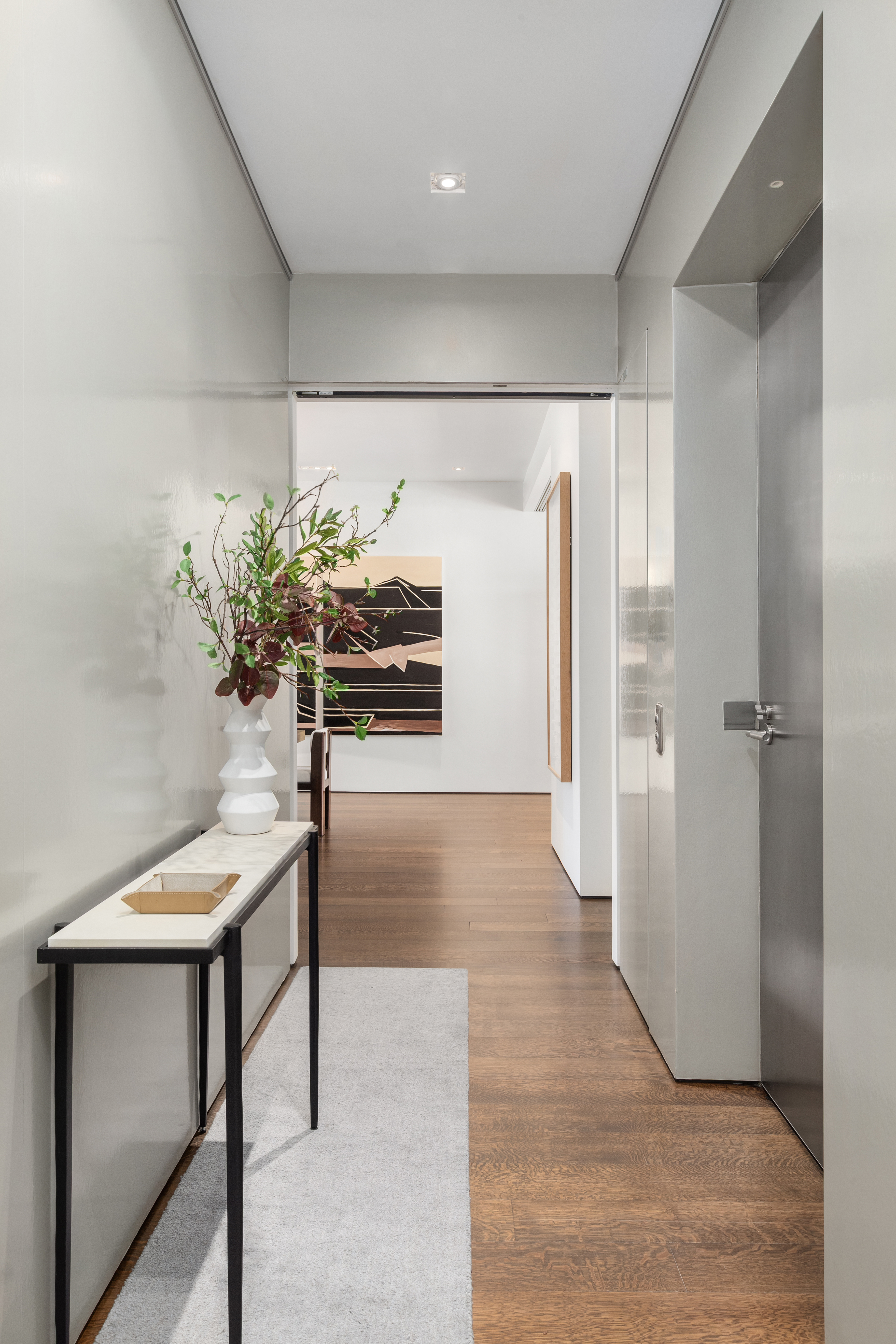33 Vestry Street Manhattan, NY 10013 - Photo 14 of 16 a view of a hallway and dining room