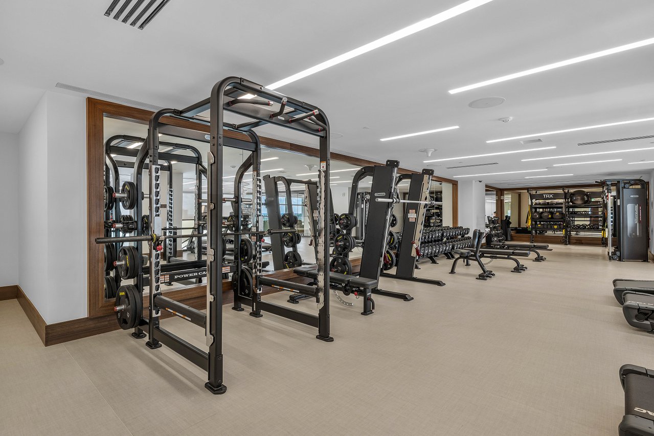 210 Southeast Mizner Boulevard, Unit 101 Boca Raton, FL 33432 - Photo 28 of 31 a view of a room with gym equipment