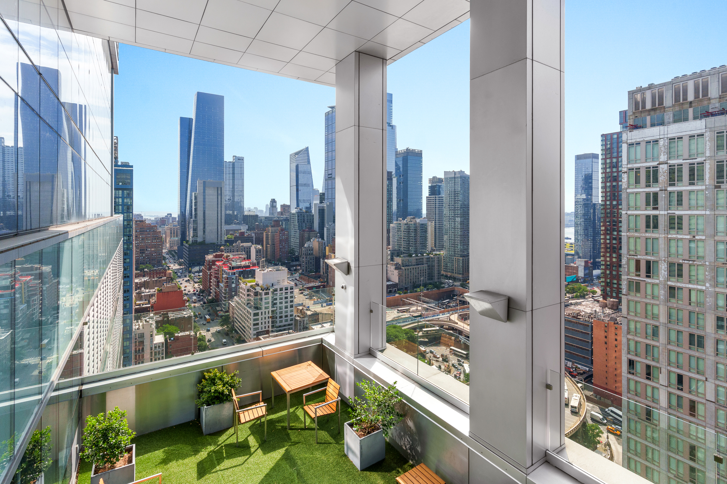 350 West 42nd Street, Unit 27K Manhattan, NY 10036 - Photo 12 of 18 a city view from a balcony with patio
