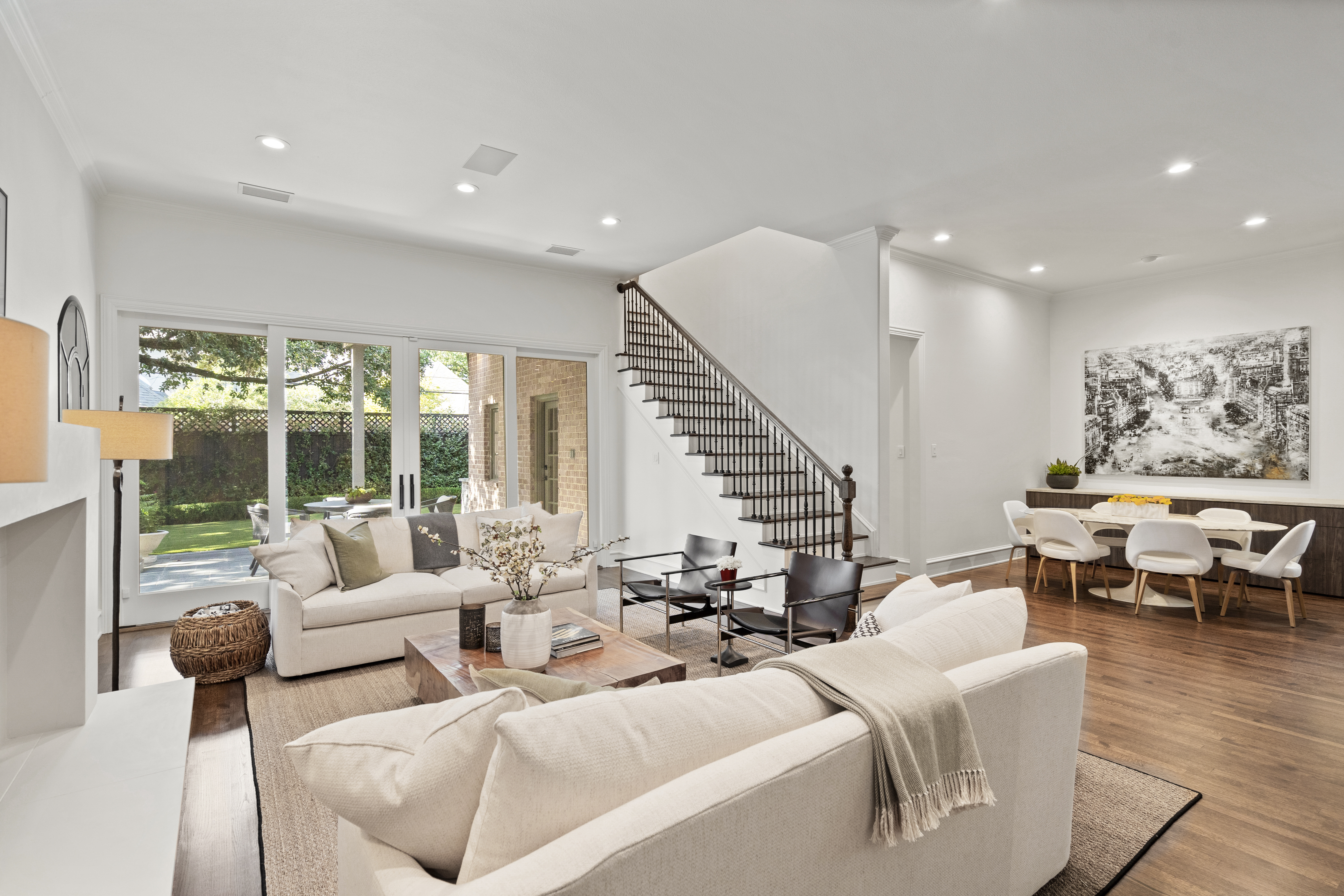 6607 Meadow Road Dallas, TX 75230 - Photo 15 of 32 a living room with furniture and large windows