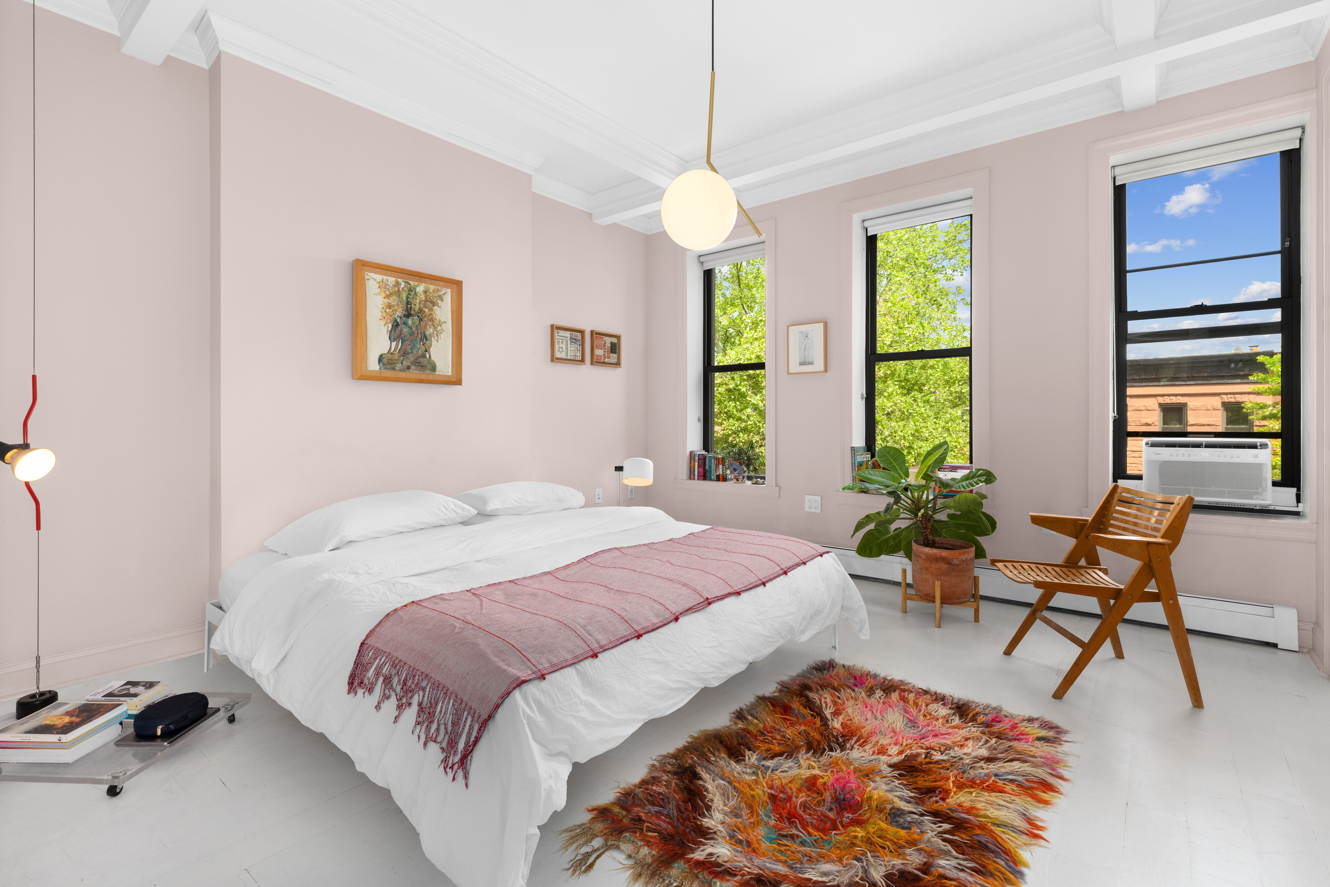 778 Hancock Street, Unit 2 Brooklyn, NY 11233 - Photo 6 of 11 a bed room with a bed and a chair