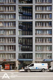 a cars parked in front of a building