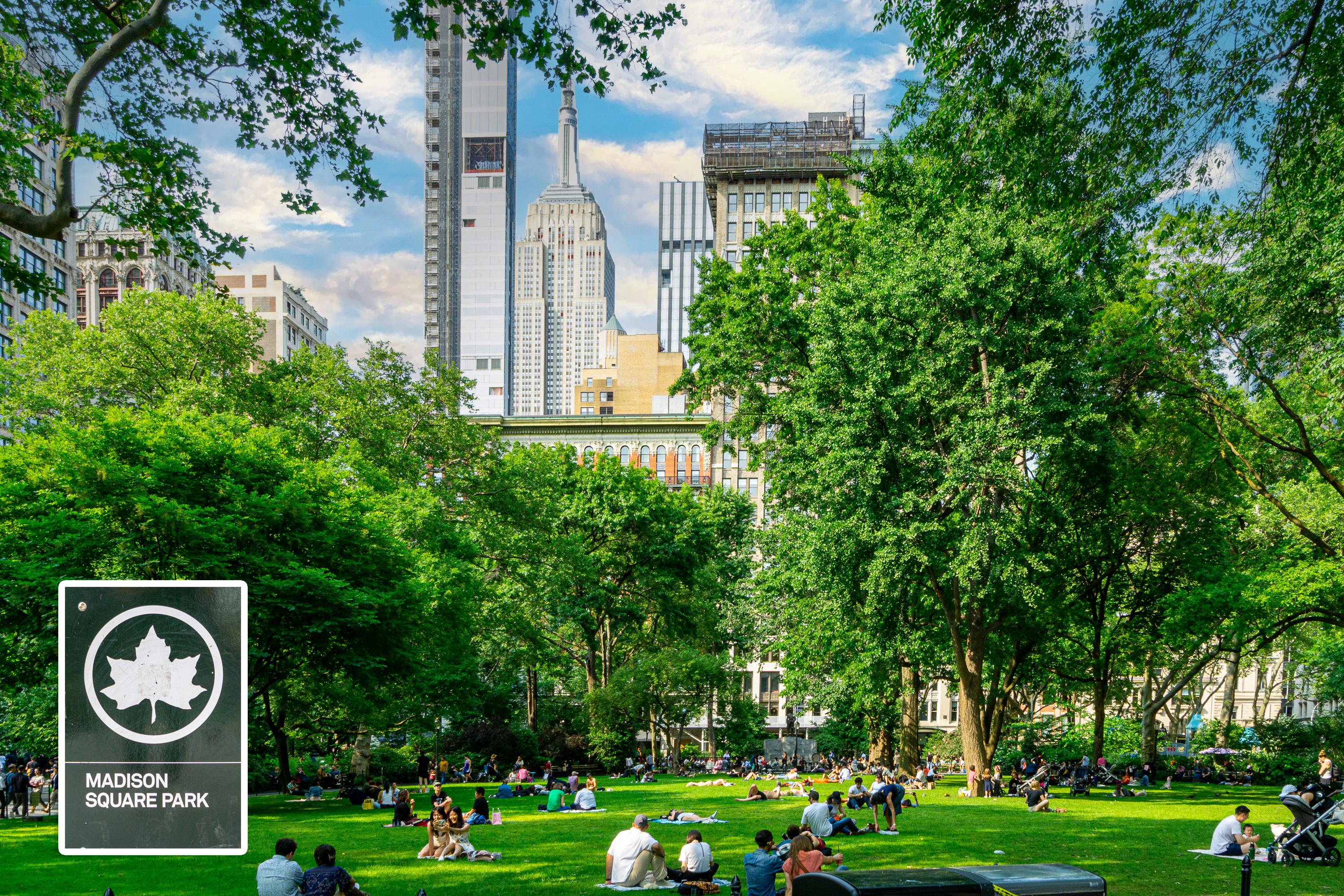 319 East 25th Street, Unit 5C Manhattan, NY 10010 - Photo 13 of 14 a sign board with a play ground in the back yard