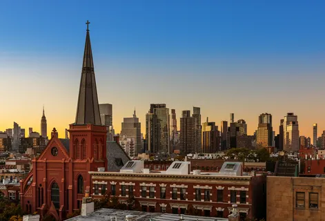 a view of city with tall buildings