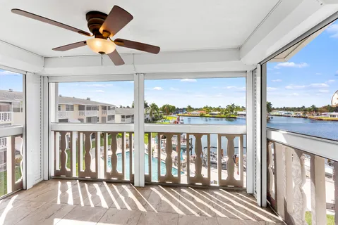 a kitchen with a sink appliances and cabinets