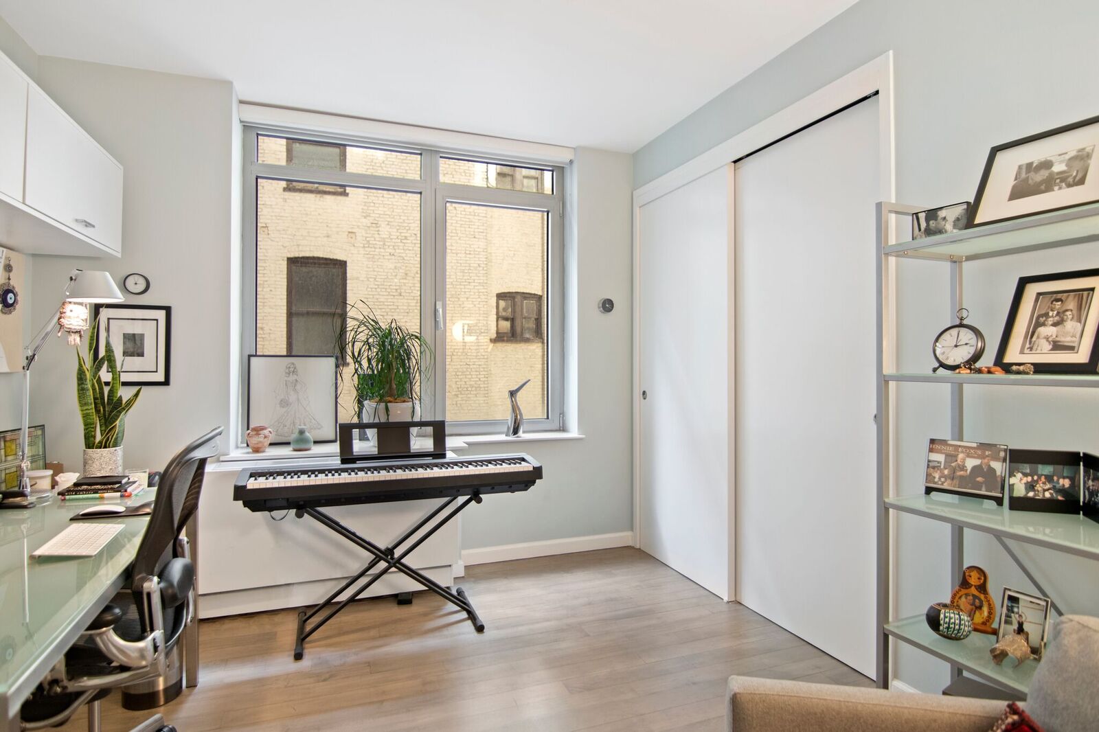 224 West 18th Street, Unit 6C Manhattan, NY 10011 - Photo 10 of 21 a work room with furniture and a window