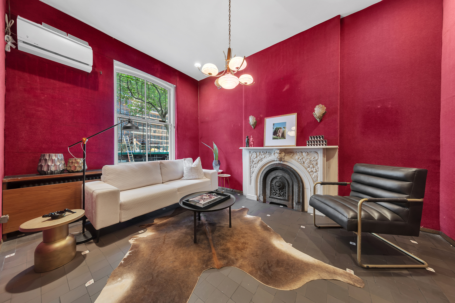 206 East 30th Street Manhattan, NY 10016 - Photo 8 of 17 a living room with furniture and a fireplace